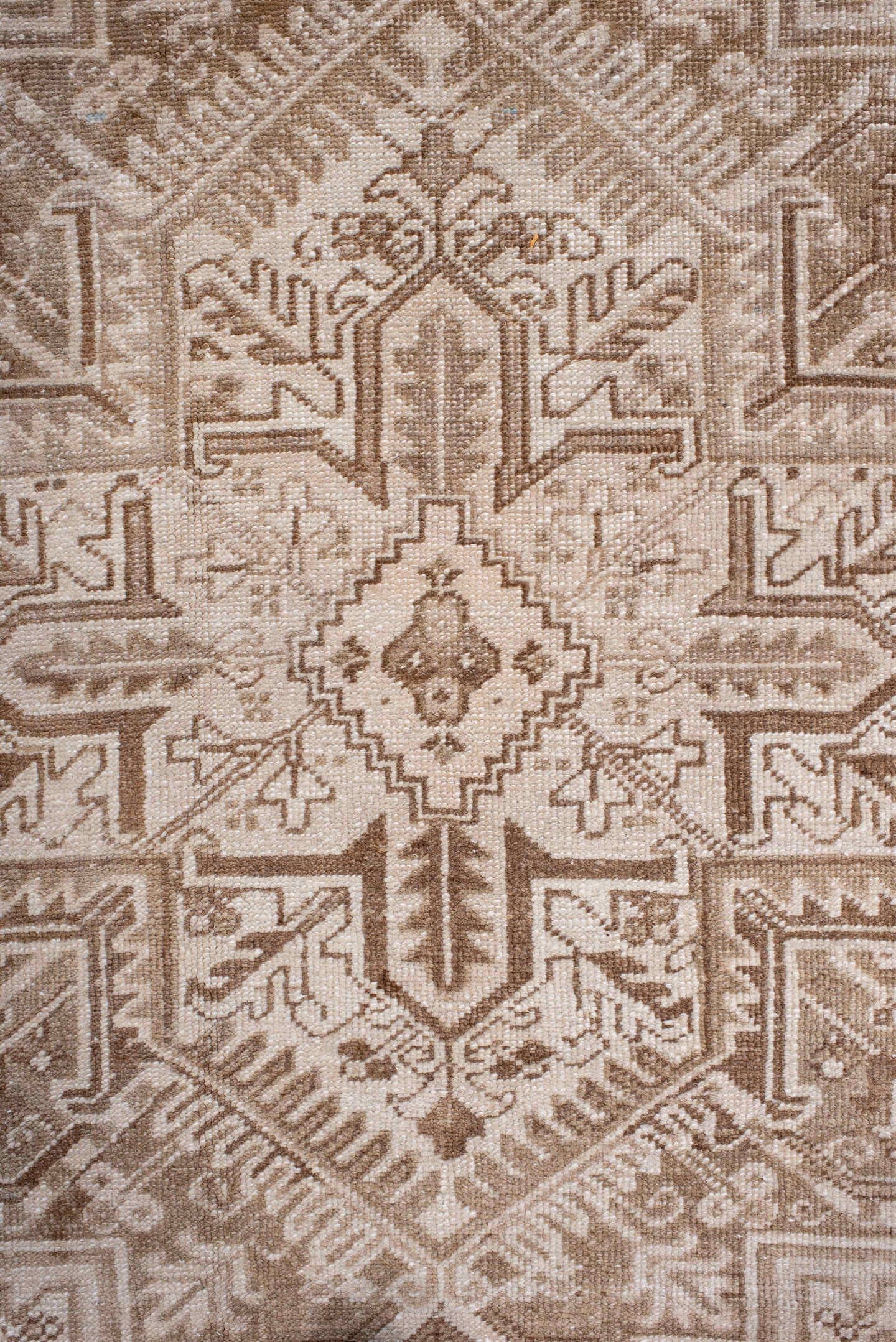 7' x 9' one-of-a-kind handmade antique Heriz rug. Color palette: ivory, camel, taupe, beige, sand, gray