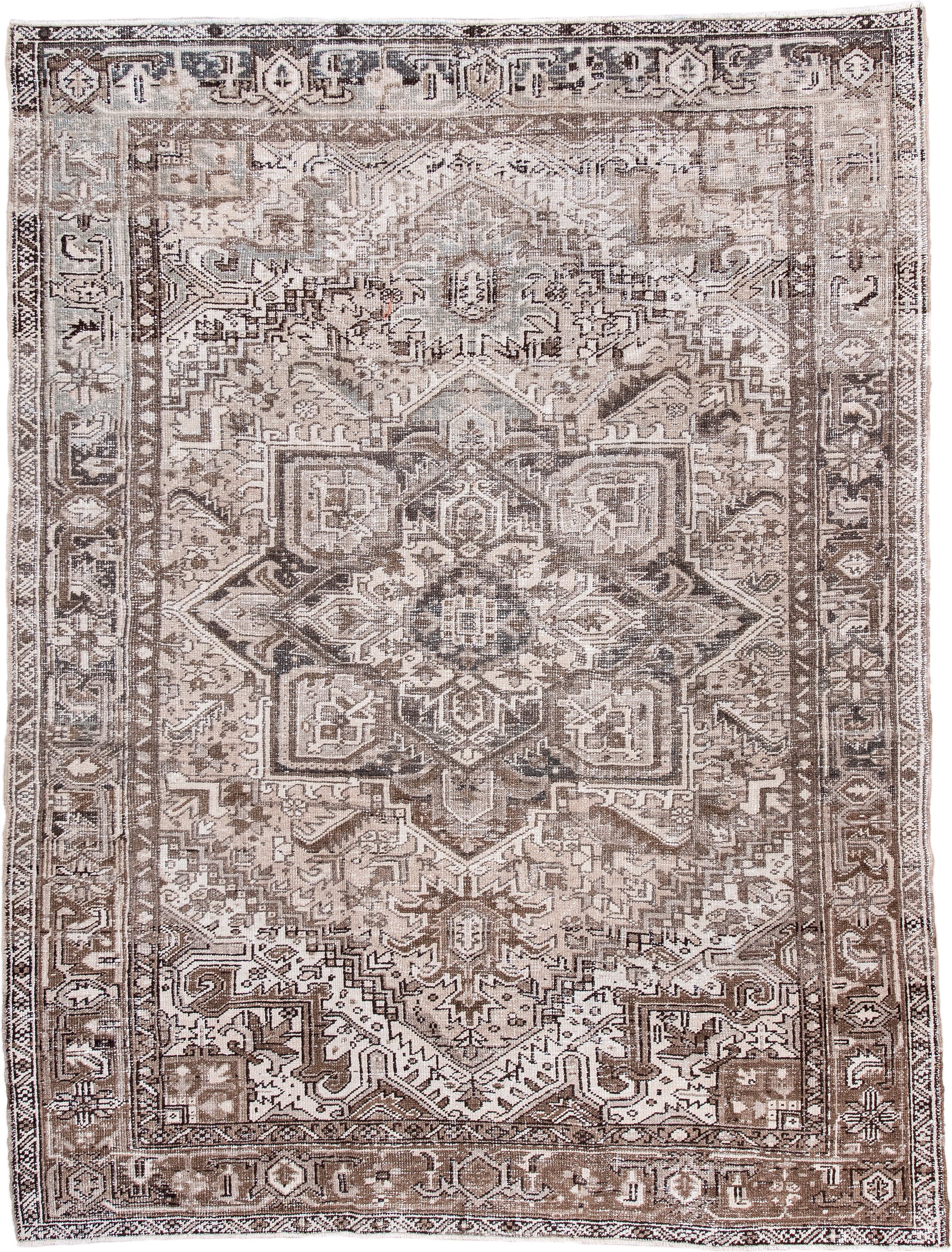 6' x 8' one-of-a-kind handmade antique Heriz medium size rug. Color palette: taupe, ivory, brown, rose, charcoal, beige