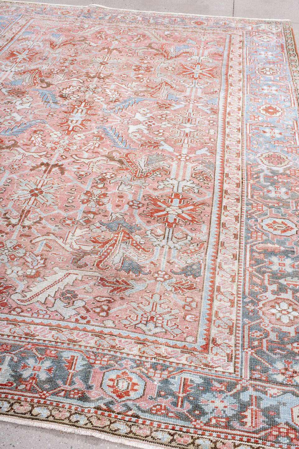 8' x 10' one-of-a-kind handmade antique Heriz large size rug. Color palette: rose, sky blue, ivory, terra cotta, rust, taupe