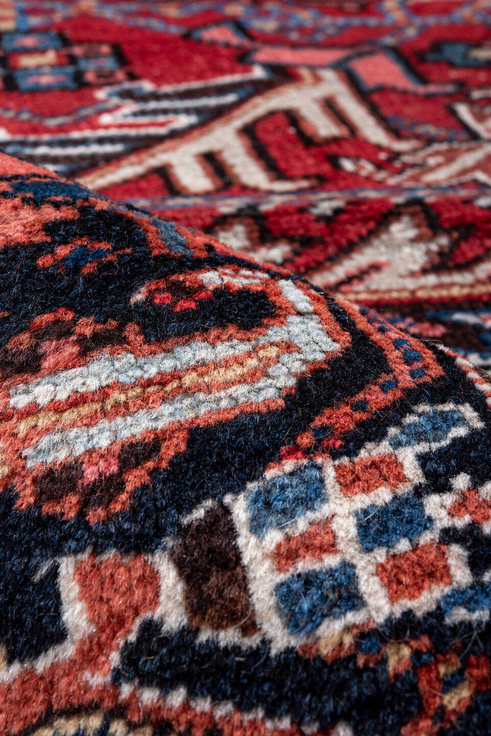 7' x 10' one-of-a-kind handmade vintage Heriz large size rug. Color palette: black, blue, brown, dark gray, fiord, gray