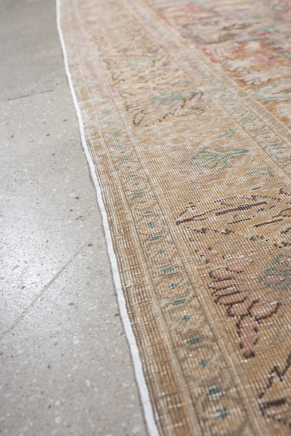 5' x 7' one-of-a-kind handmade antique Hereke rug. Color palette: blush, ivory, celadon, peach, coral, taupe, sage, brown