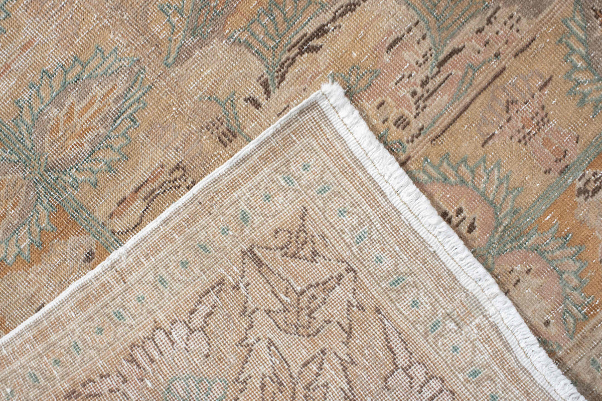 5' x 7' one-of-a-kind handmade antique Hereke rug. Color palette: blush, ivory, celadon, peach, coral, taupe, sage, brown