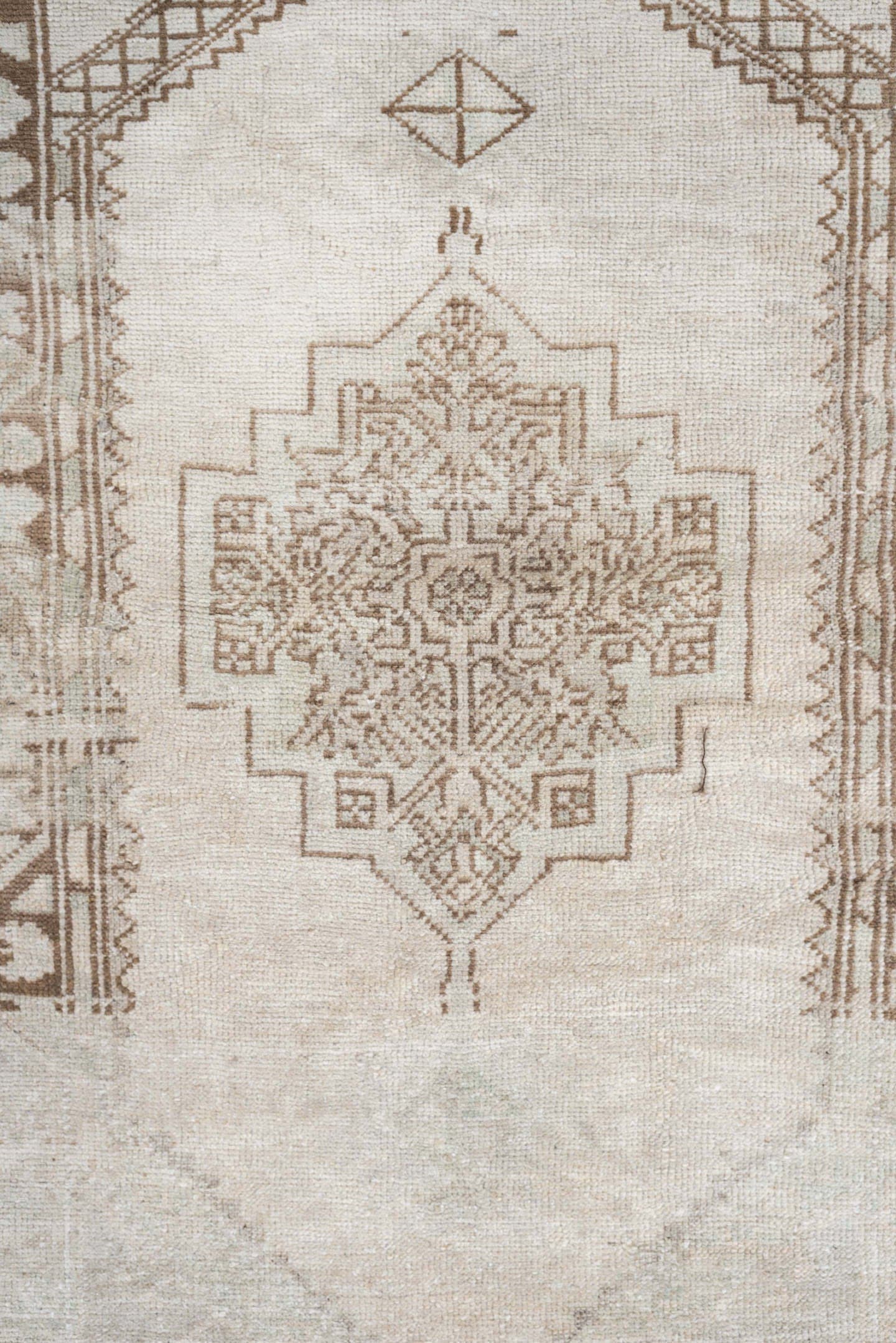 3' x 6' one-of-a-kind handmade antique Anatolian rug. Color palette: ivory, taupe, beige, camel, sand, light brown, gray