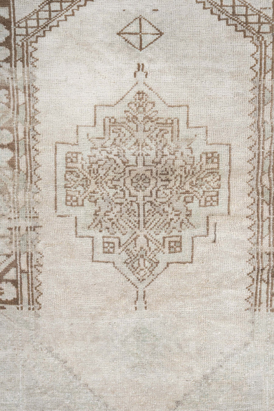 3' x 6' one-of-a-kind handmade antique Anatolian rug. Color palette: ivory, taupe, beige, camel, sand, light brown, gray