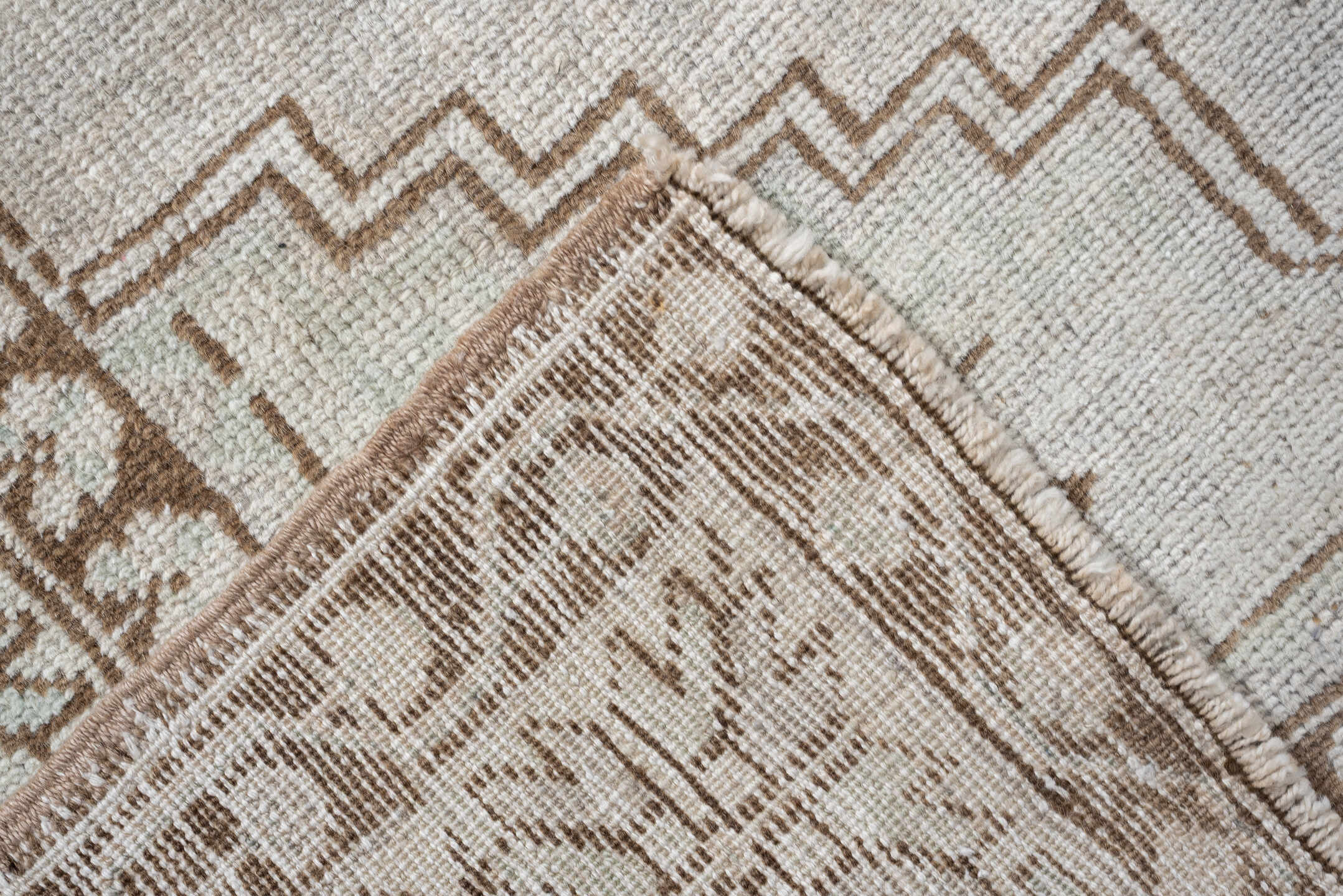 3' x 6' one-of-a-kind handmade antique Anatolian rug. Color palette: ivory, taupe, beige, camel, sand, light brown, gray