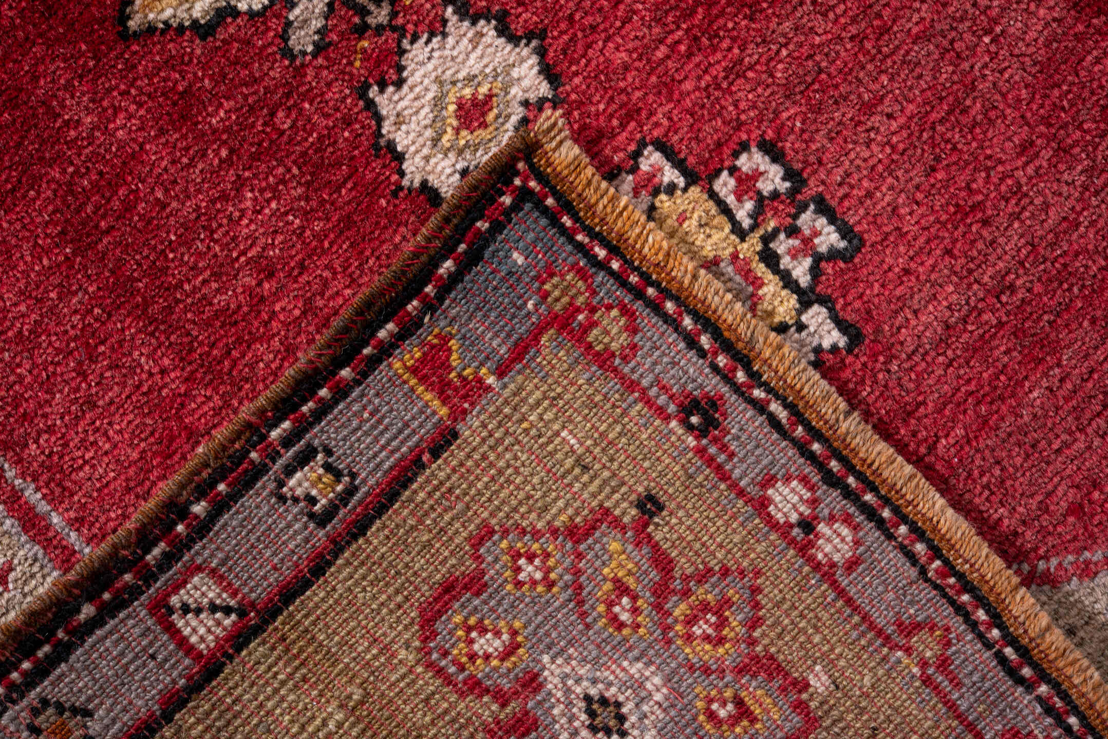 4' x 5' one-of-a-kind handmade vintage Anatolian small size rug. Color palette: crimson, camel, ivory, gold, charcoal, rust