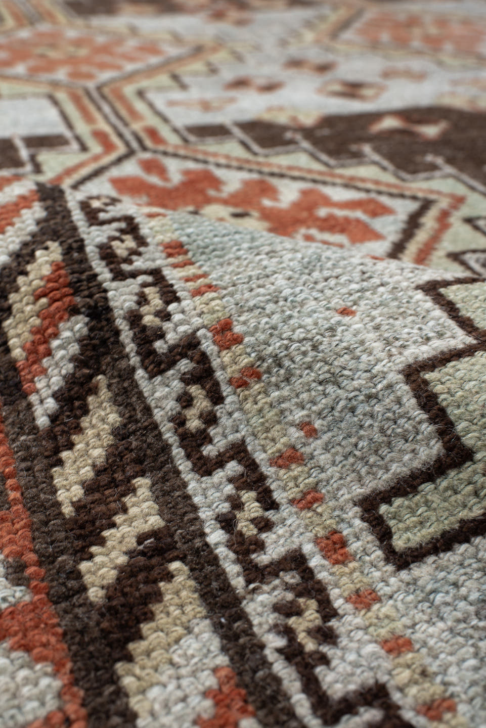 4' x 6' one-of-a-kind handmade vintage Gabbe rug. Color palette: ivory, rust, brown, charcoal, camel, pale blue, terracotta
