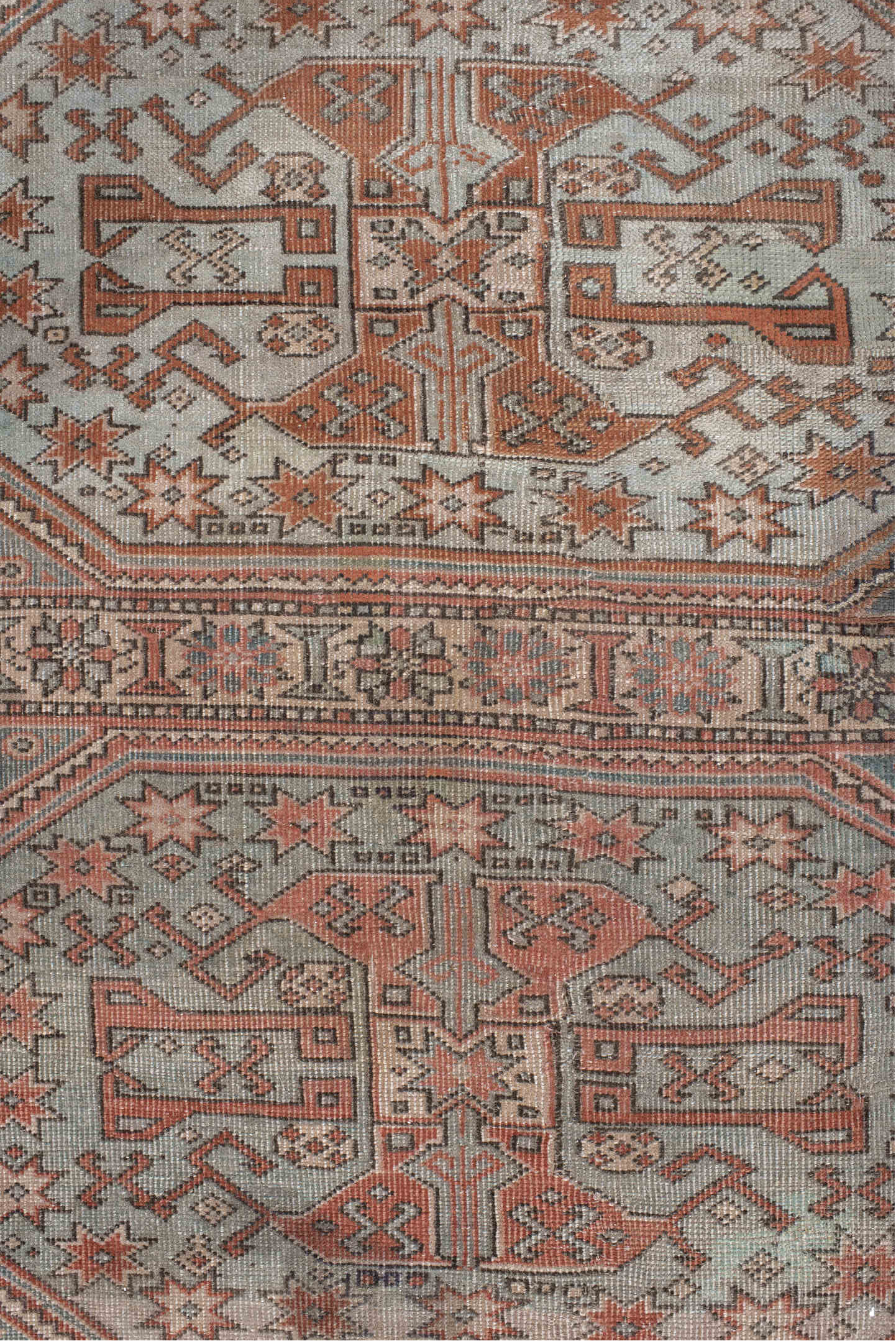 5' x 7' one-of-a-kind handmade vintage Anatolian rug. Color palette: black, brown, gray, light gray, off-white, pink, red
