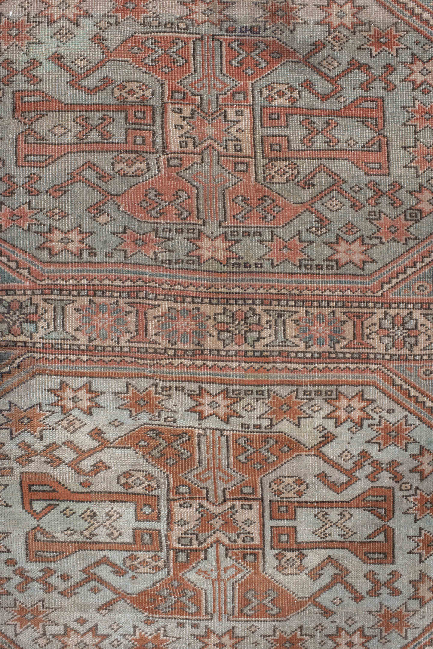 5' x 7' one-of-a-kind handmade antique Anatolian rug. Color palette: ivory, rust, blue_gray, charcoal, terracotta, taupe