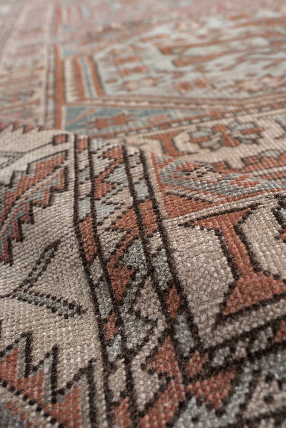 5' x 7' one-of-a-kind handmade antique Anatolian rug. Color palette: ivory, rust, blue_gray, charcoal, terracotta, taupe