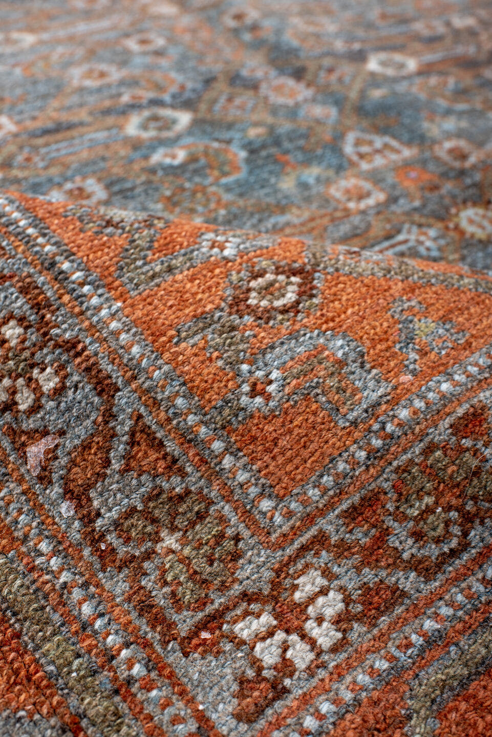 4' x 7' one-of-a-kind handmade antique Malayer rug. Color palette: rust, blue, ivory, slate, charcoal, taupe, camel