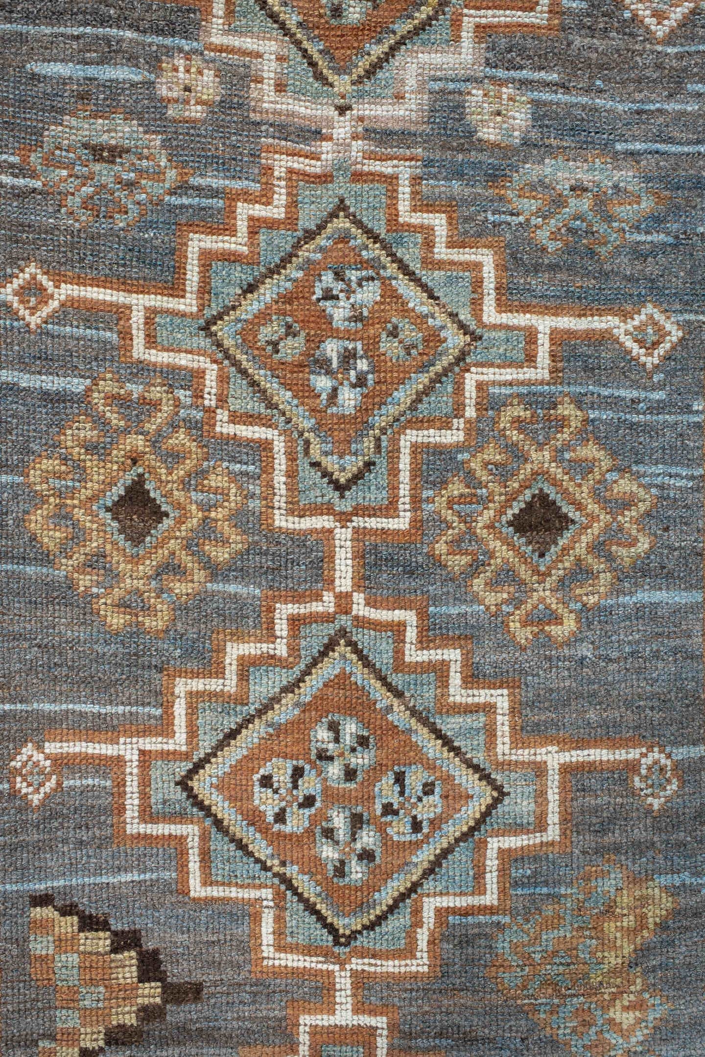 3' x 7' one-of-a-kind handmade antique Gabbe rug. Color palette: blue, rust, ivory, brown, camel, teal, charcoal, terracotta
