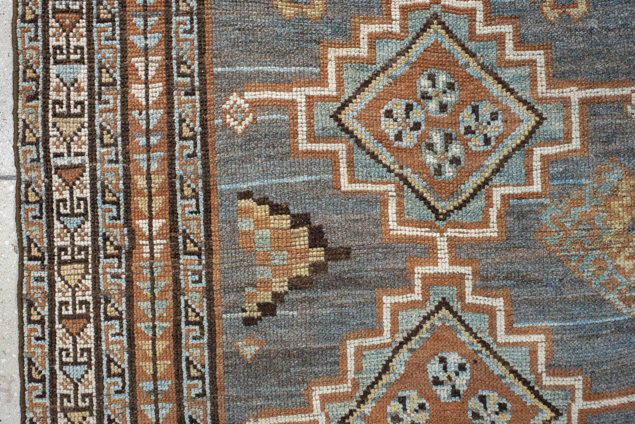 3' x 7' one-of-a-kind handmade antique Gabbe rug. Color palette: blue, rust, ivory, brown, camel, teal, charcoal, terracotta