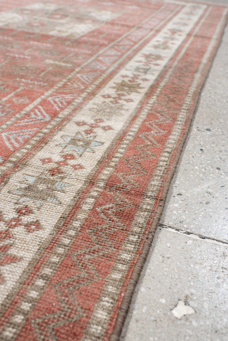 3' x 7' one-of-a-kind handmade antique Belouch runner rug. Color palette: terra cotta, ivory, taupe, brown, slate, rust
