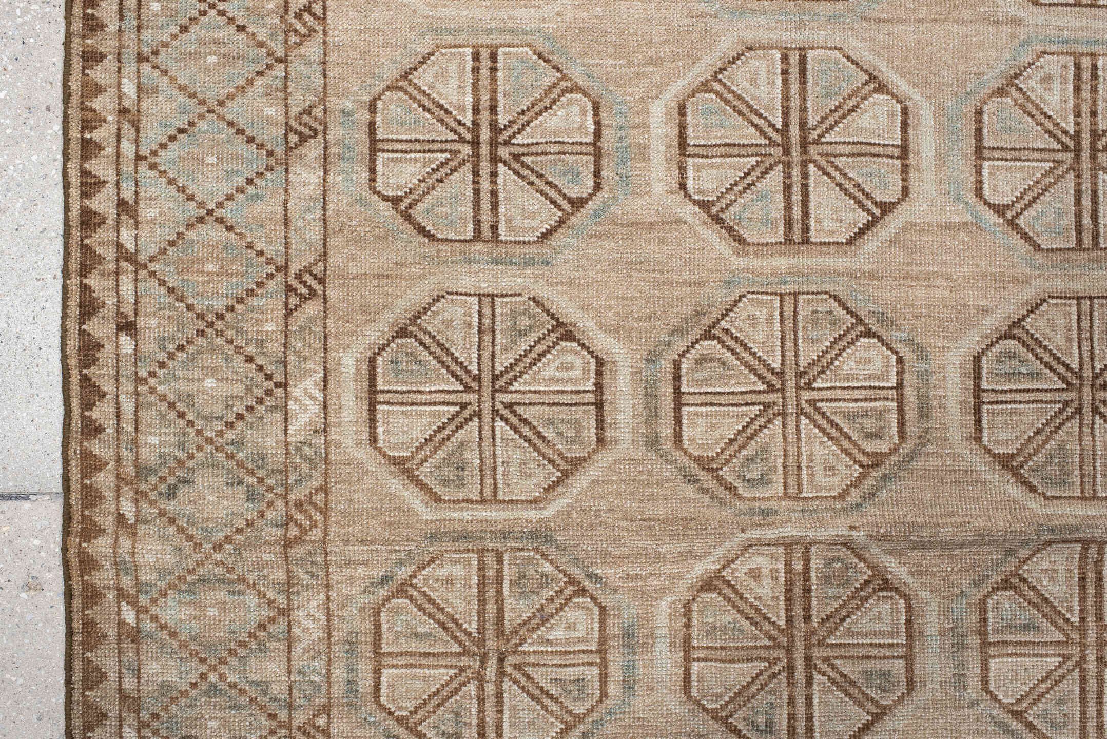 3' x 6' one-of-a-kind handmade antique Belouch rug. Color palette: ivory, camel, taupe, brown, pale blue, beige, gray
