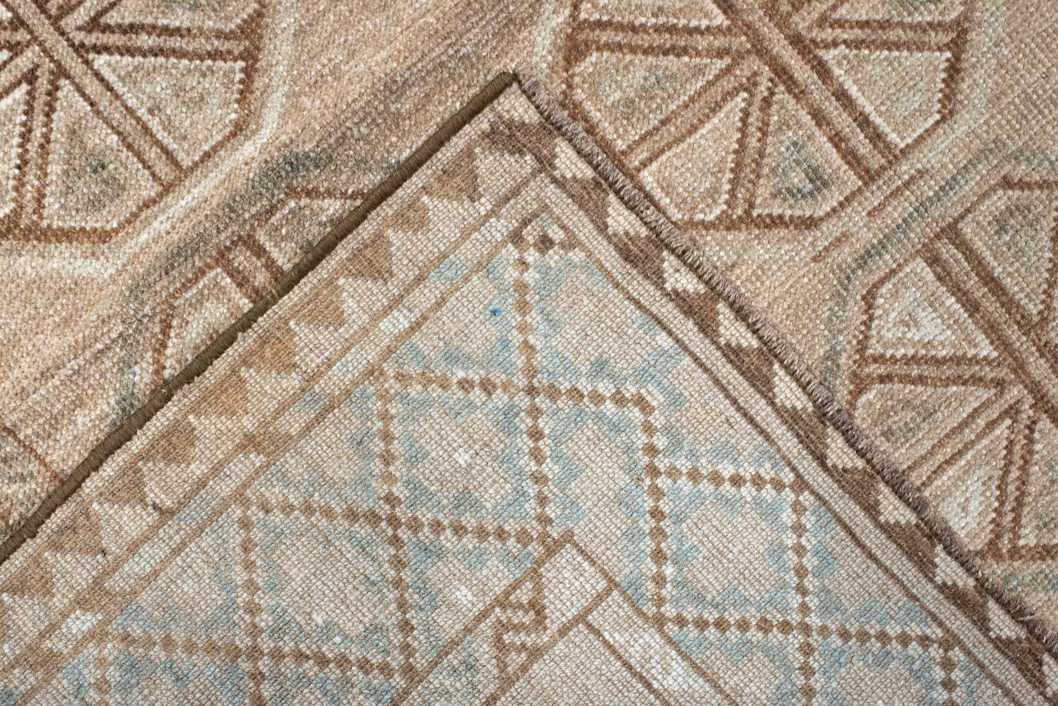 3' x 6' one-of-a-kind handmade antique Belouch rug. Color palette: ivory, camel, taupe, brown, pale blue, beige, gray
