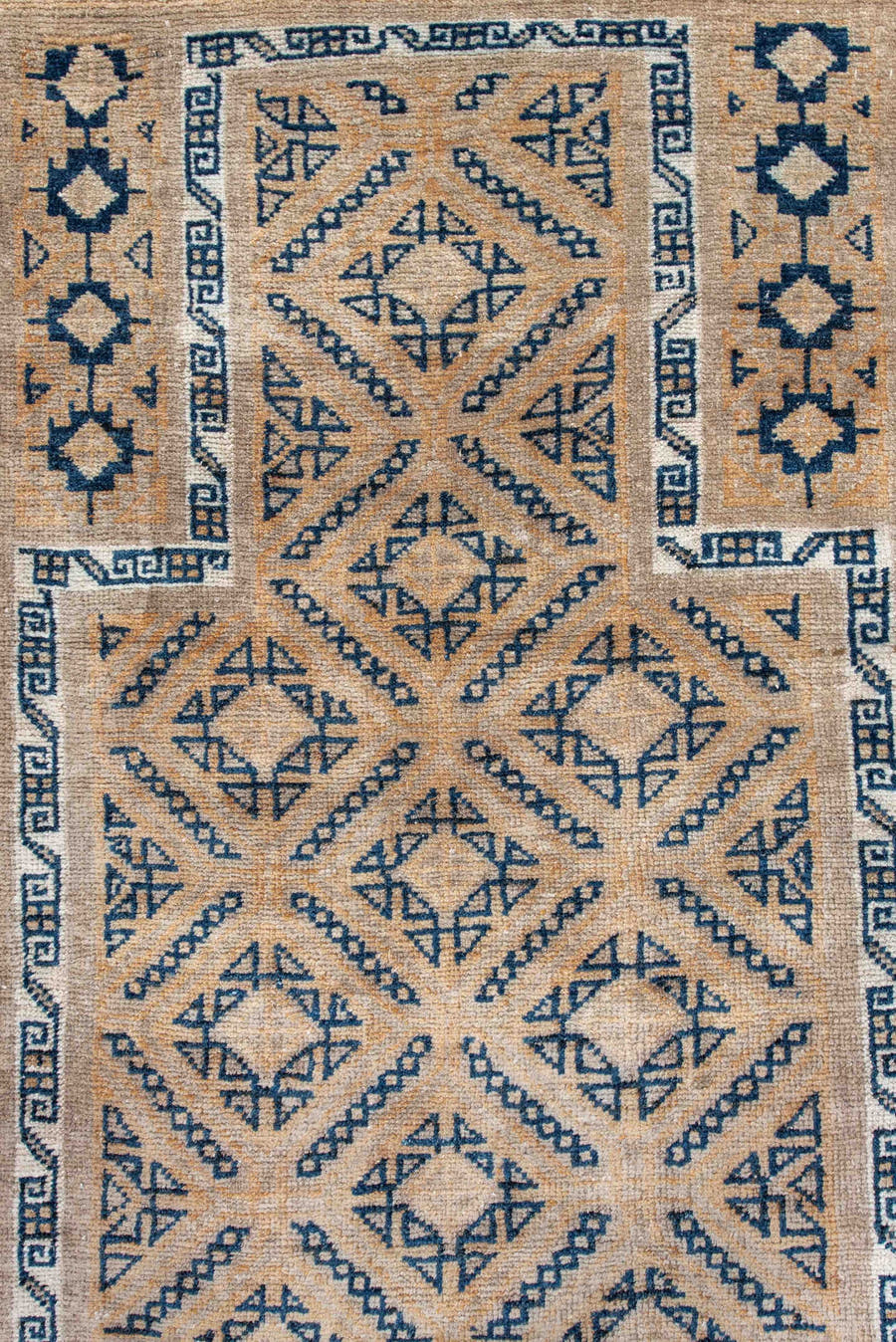 3' x 5' one-of-a-kind handmade antique Belouch small size rug. Color palette: camel, indigo, ivory, taupe, sand, beige