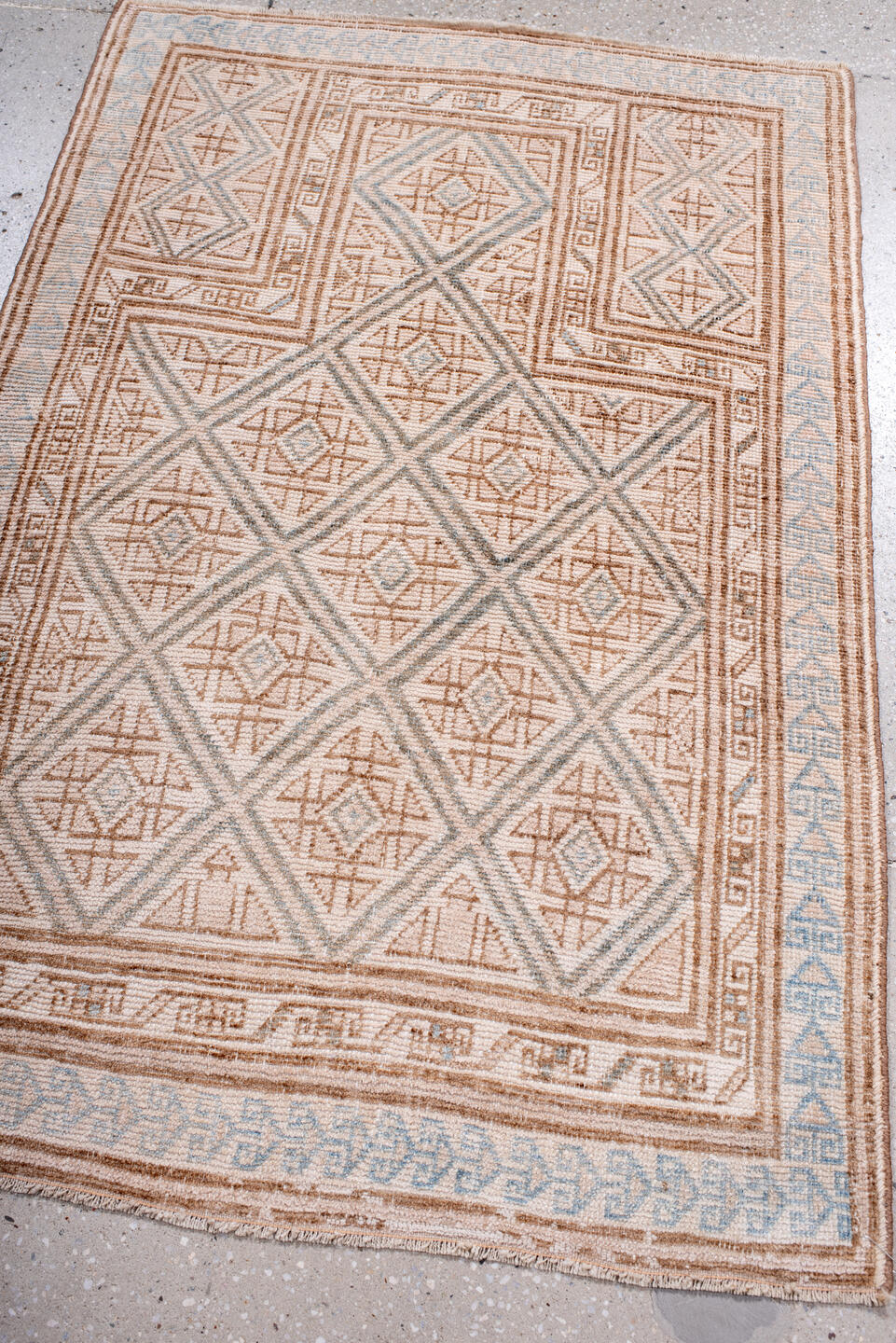3' x 4' one-of-a-kind handmade antique Belouch small size rug. Color palette: ivory, camel, pale blue, taupe, sand, beige