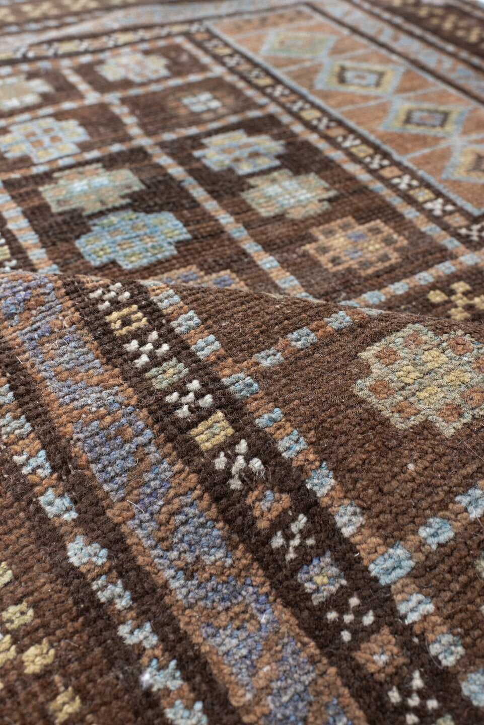 2' x 4' one-of-a-kind handmade vintage Belouch small size rug. Color palette: antiquewhite, blanched almond, brown