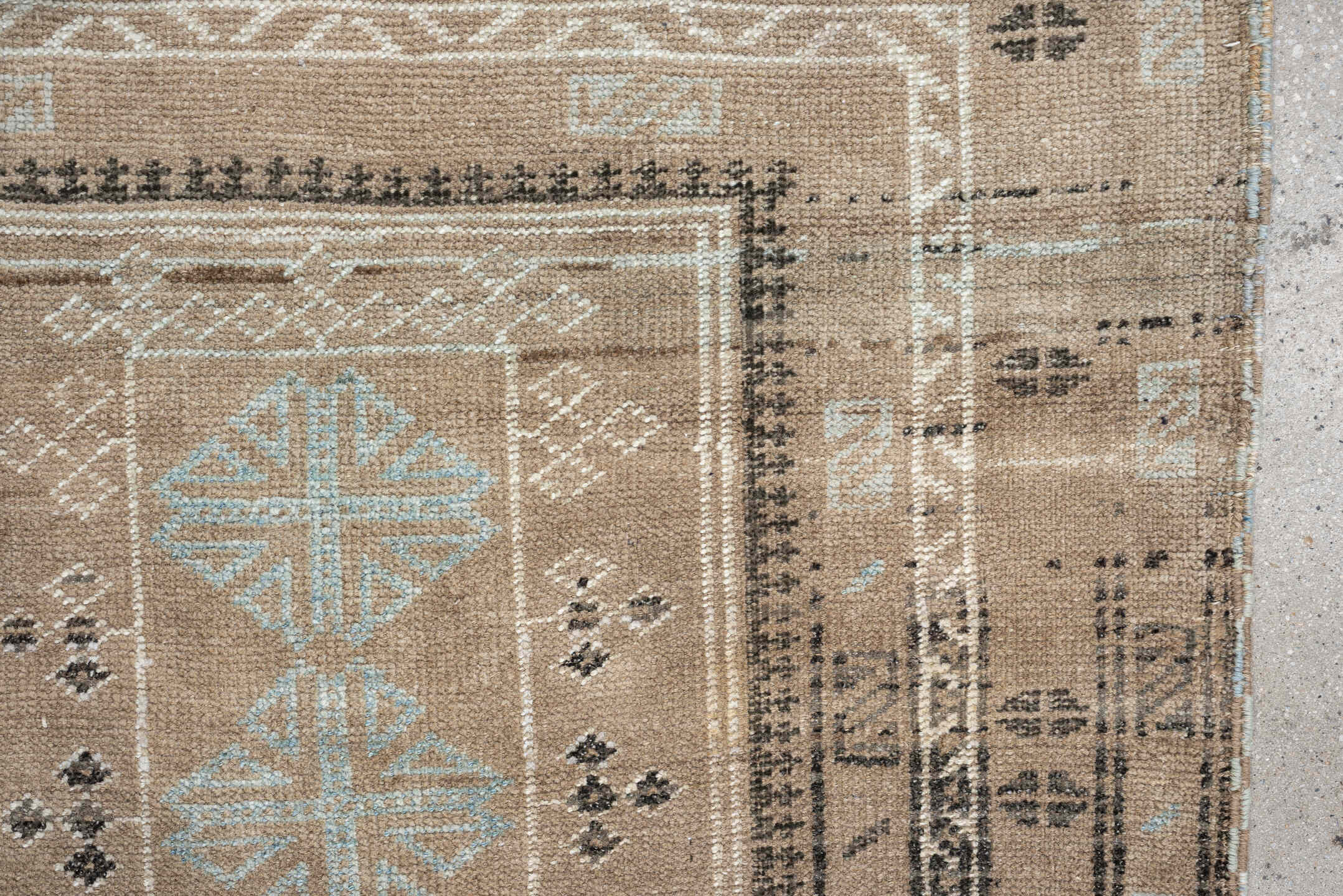 2' x 3' one-of-a-kind handmade antique Belouch small size rug. Color palette: camel, ivory, pale blue, charcoal, taupe