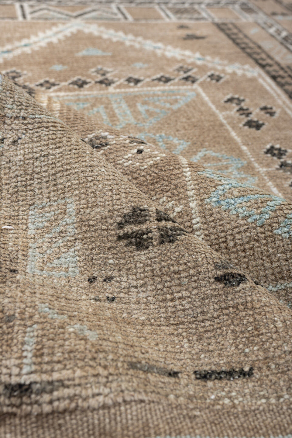 2' x 3' one-of-a-kind handmade antique Belouch small size rug. Color palette: camel, ivory, pale blue, charcoal, taupe