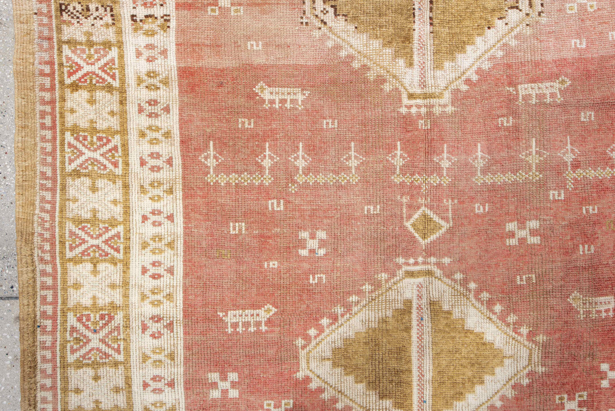 4' x 8' one-of-a-kind handmade antique Moroccan rug. Color palette: salmon, ivory, ochre, camel, rose, tan, blue, pink, gold