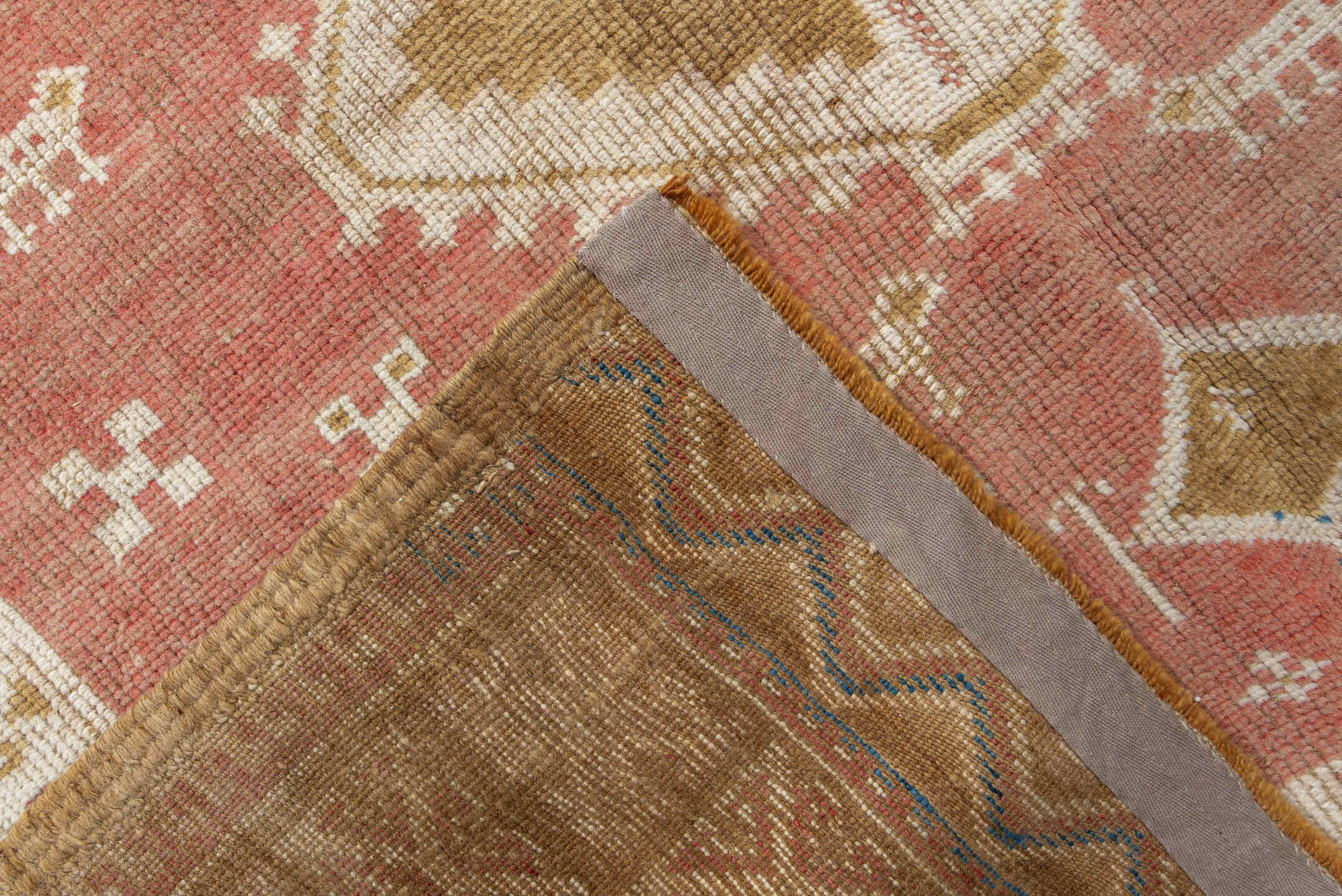 4' x 8' one-of-a-kind handmade antique Moroccan rug. Color palette: salmon, ivory, ochre, camel, rose, tan, blue, pink, gold