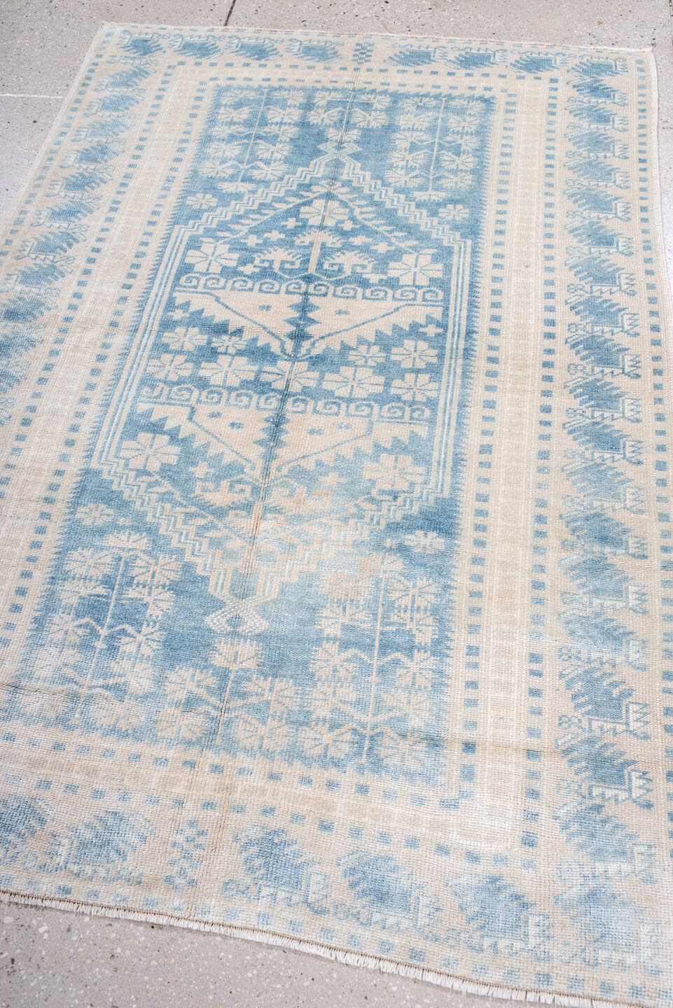 3' x 5' one-of-a-kind handmade antique Anatolian small size rug. Color palette: ivory, sky blue, powder blue, cream