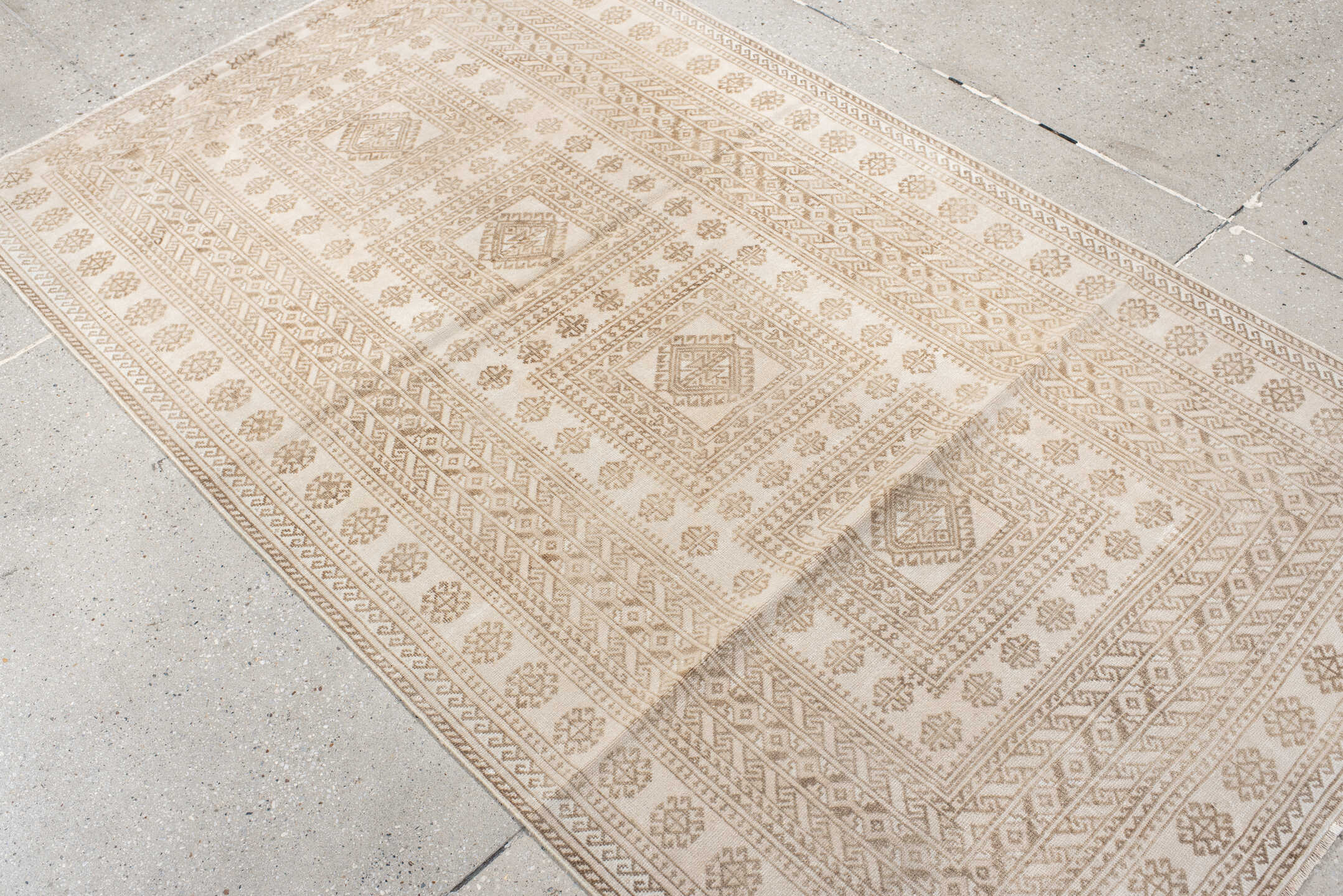 3' x 6' one-of-a-kind handmade vintage Belouch small size rug. Color palette: ivory, camel, taupe, beige, gray