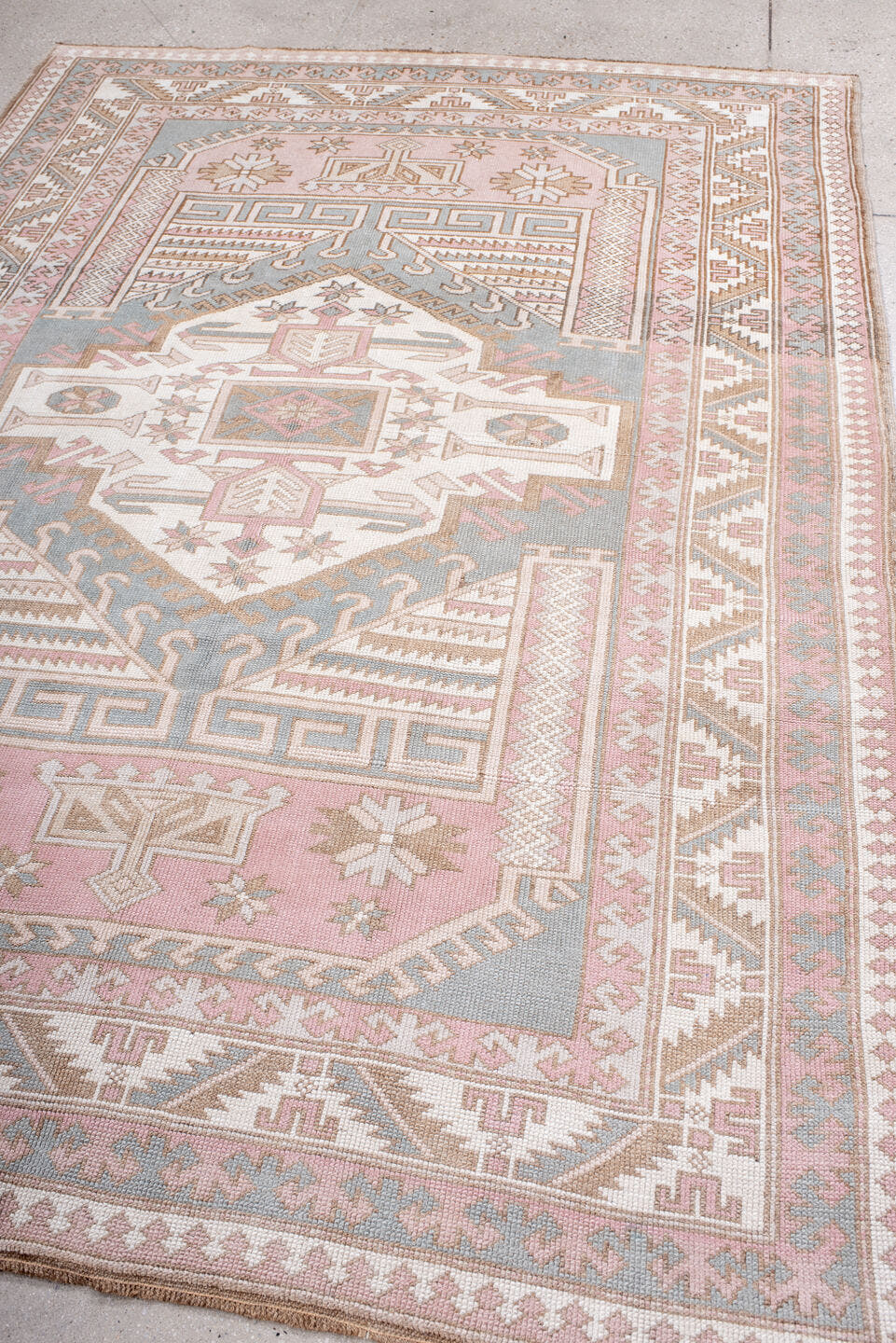 5' x 8' one-of-a-kind handmade antique Oushak medium size rug. Color palette: blush, ivory, pale blue, taupe, sand, rose
