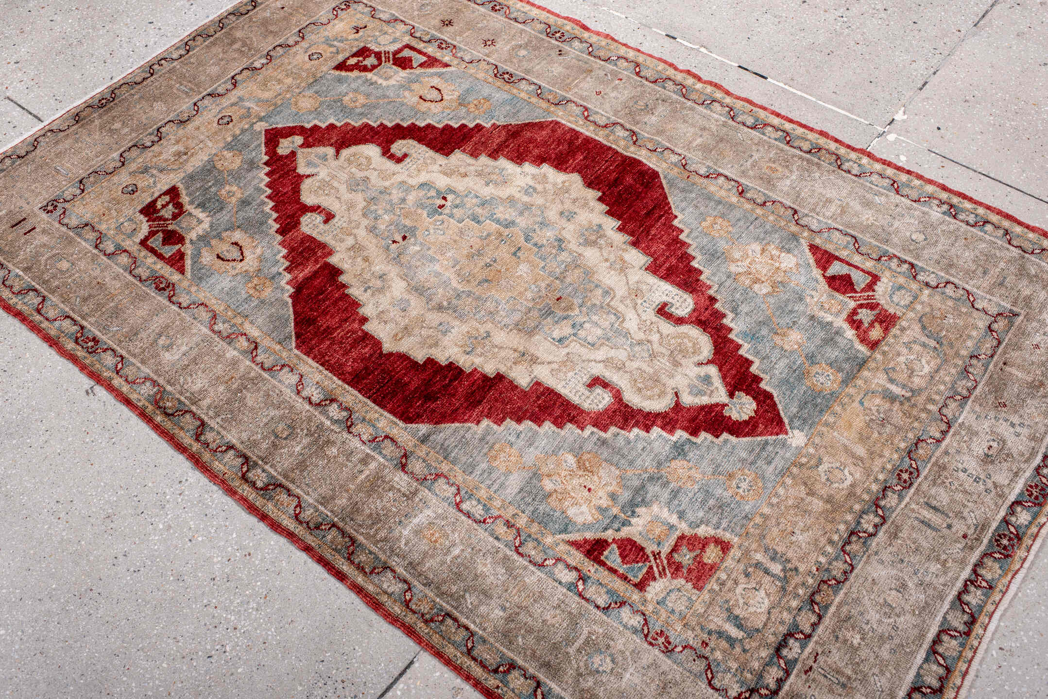3' x 5' one-of-a-kind handmade antique Anatolian small size rug. Color palette: ivory, beige, pale blue, brick red, taupe