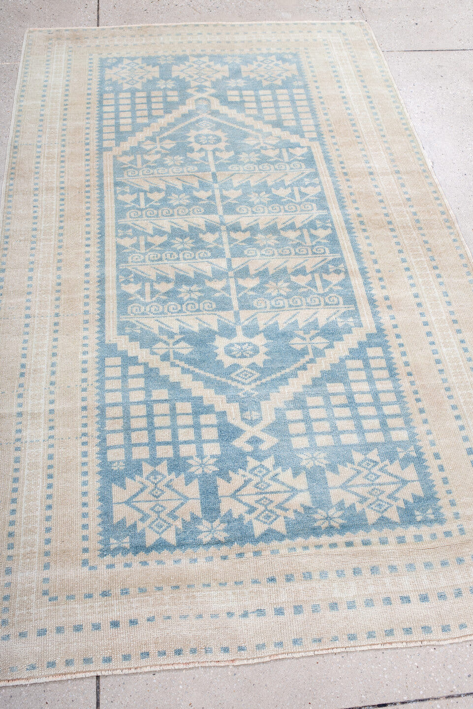 3' x 6' one-of-a-kind handmade antique Anatolian small size rug. Color palette: ivory, pale blue, sky blue, cream