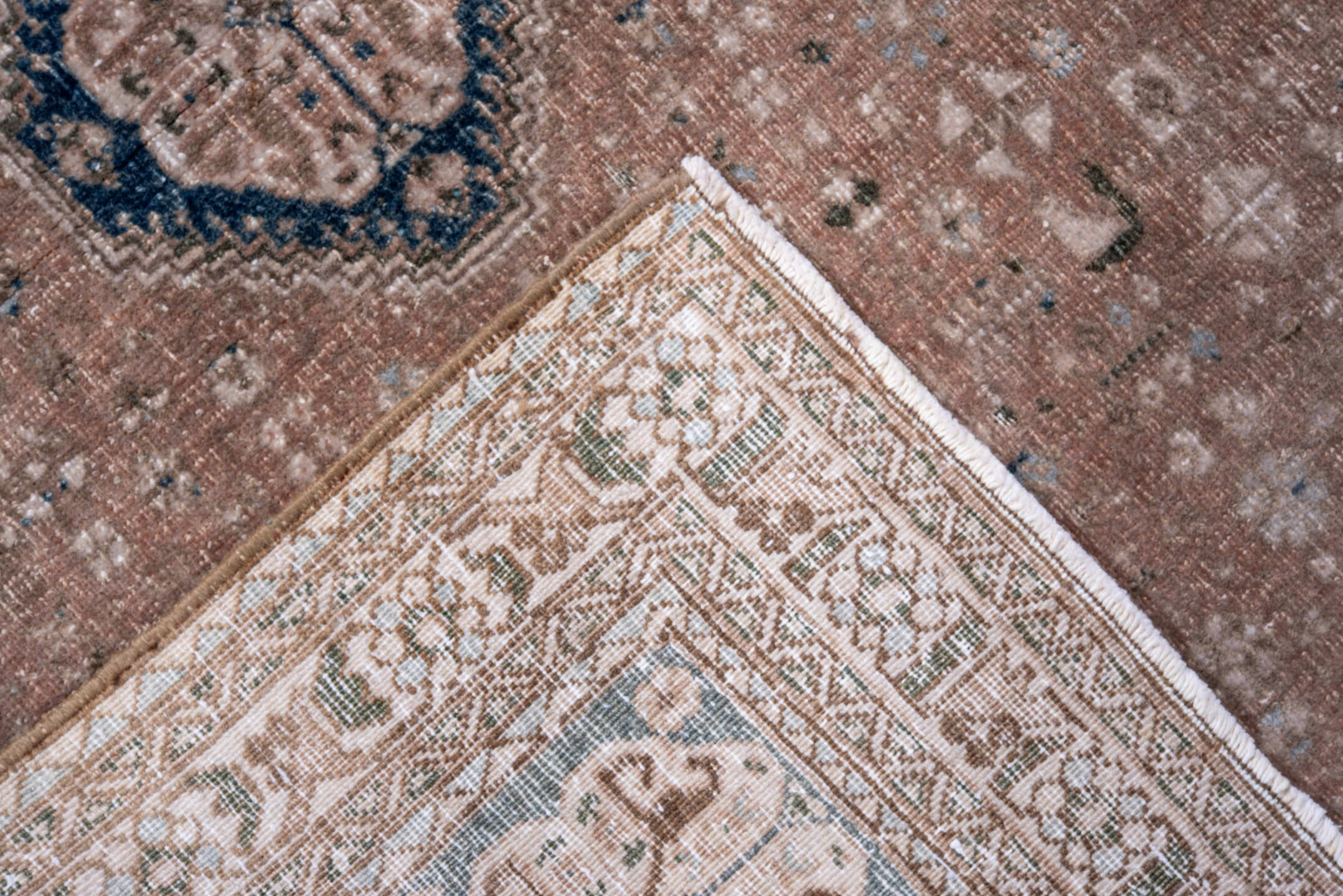3' x 4' one-of-a-kind handmade vintage Joshegan small size rug. Color palette: blush, navy, taupe, ivory, camel, slate, pink