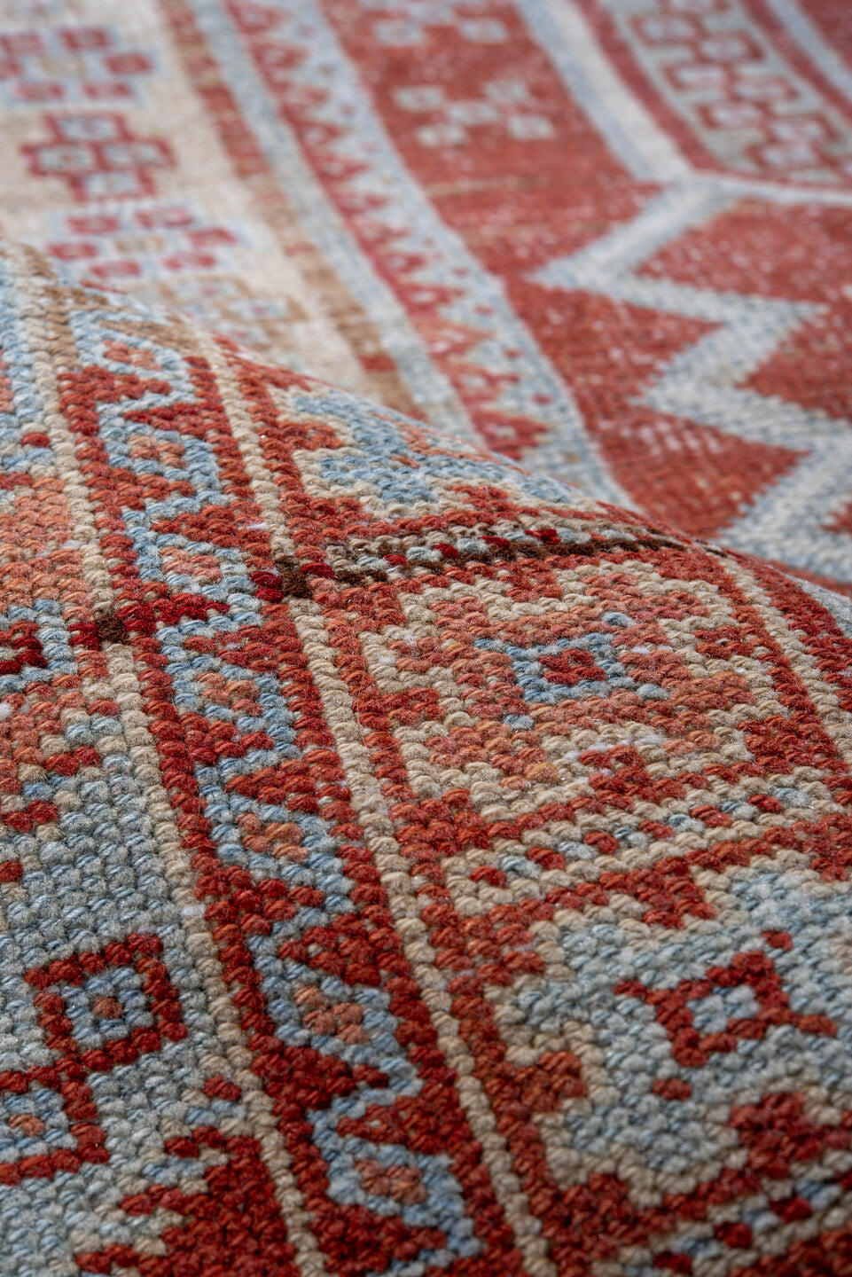 4' x 5' one-of-a-kind handmade vintage small size rug. Color palette: pink, gray, light gray, light blue, off-white, red