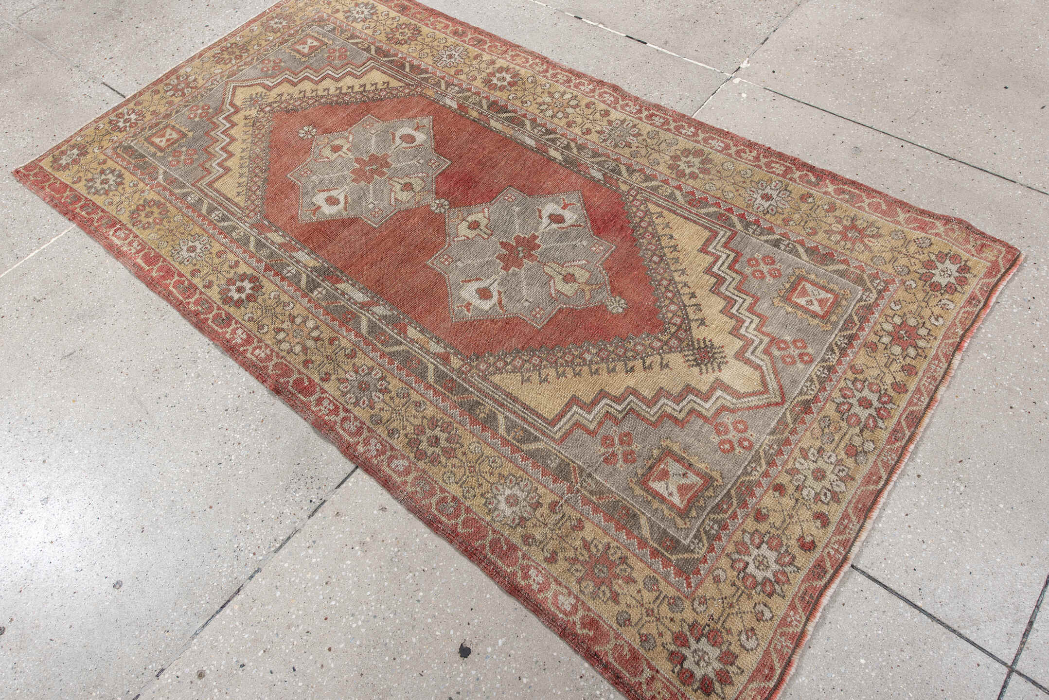 3' x 6' one-of-a-kind handmade vintage Anatol small size rug. Color palette: brown, gray, light gray, off-white, orange, red