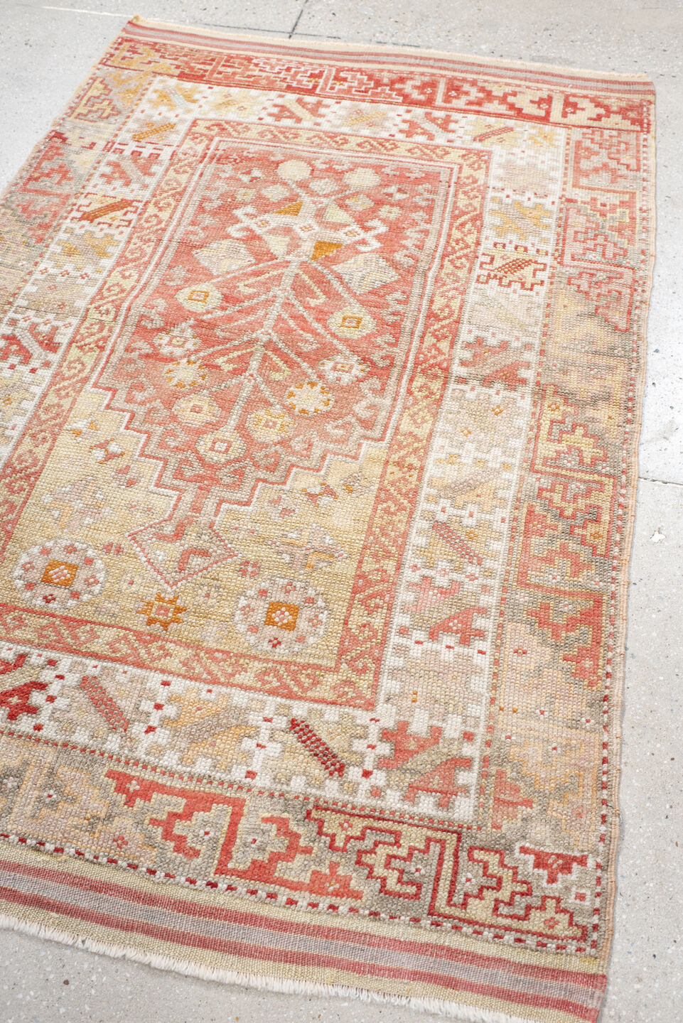 3' x 5' one-of-a-kind handmade vintage Anatol small size rug. Color palette: brown, pink, gray, red, off-white, orange