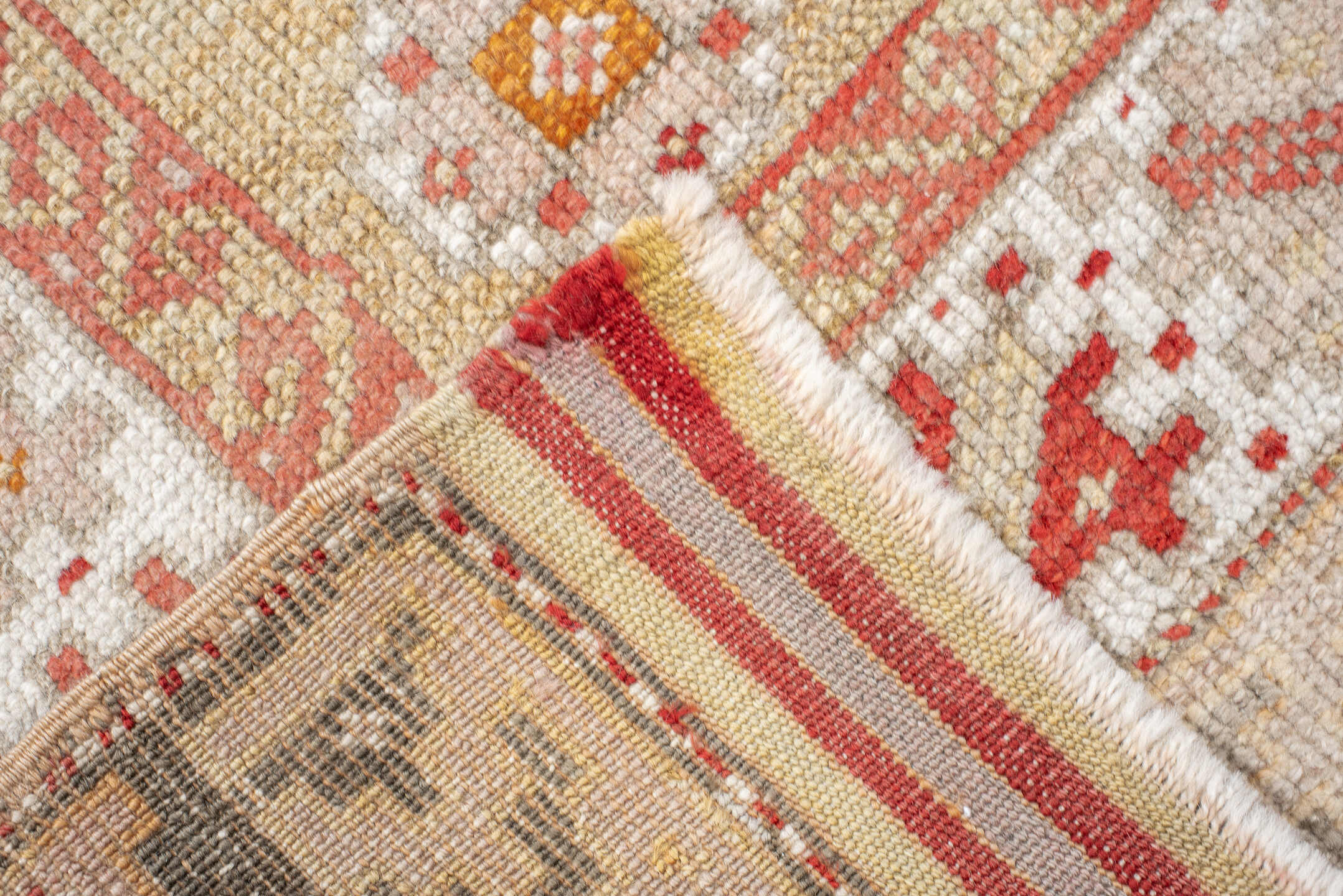 3' x 5' one-of-a-kind handmade vintage Anatolian small size rug. Color palette: ivory, coral, sand, pale_gold, taupe, rust