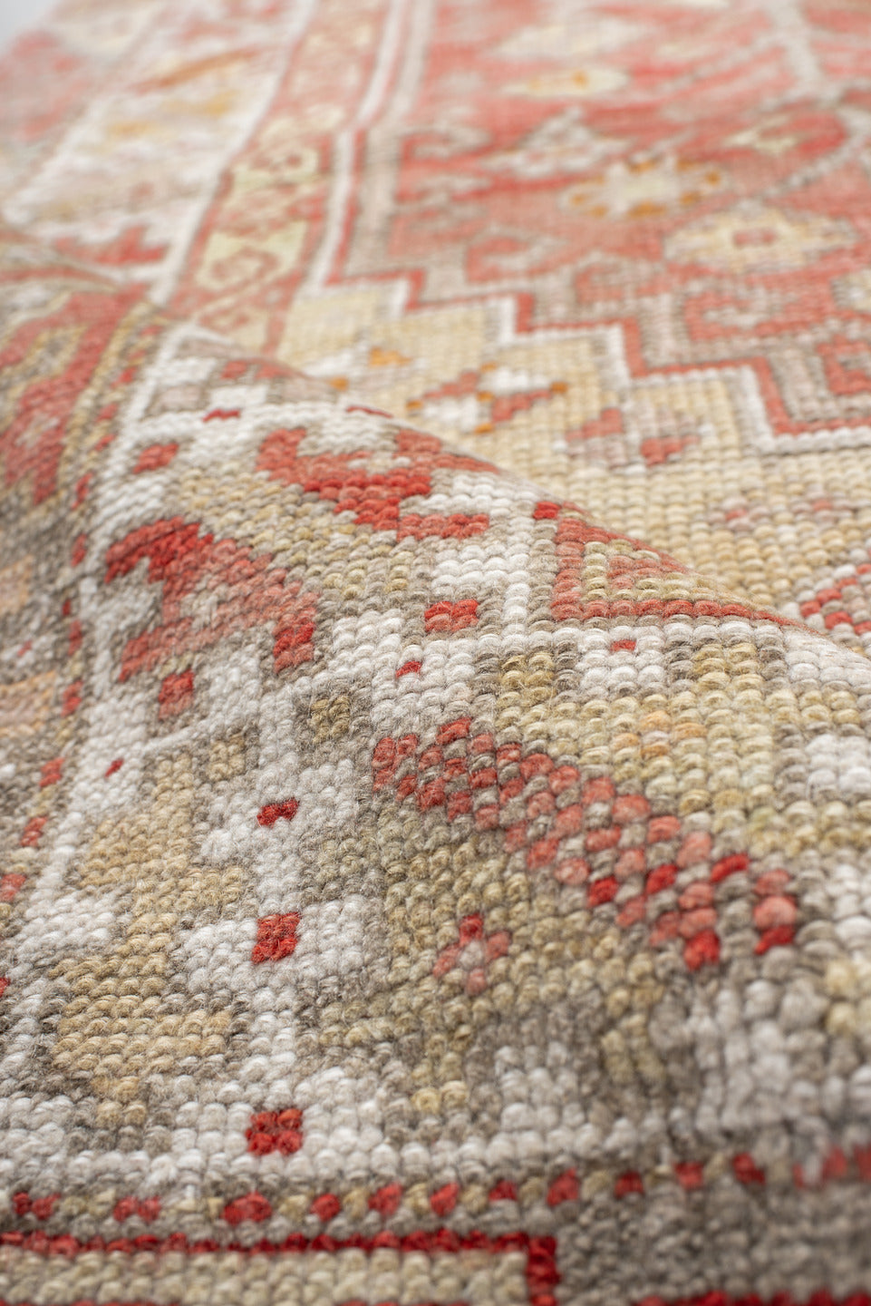 3' x 5' one-of-a-kind handmade vintage Anatol small size rug. Color palette: brown, pink, gray, red, off-white, orange