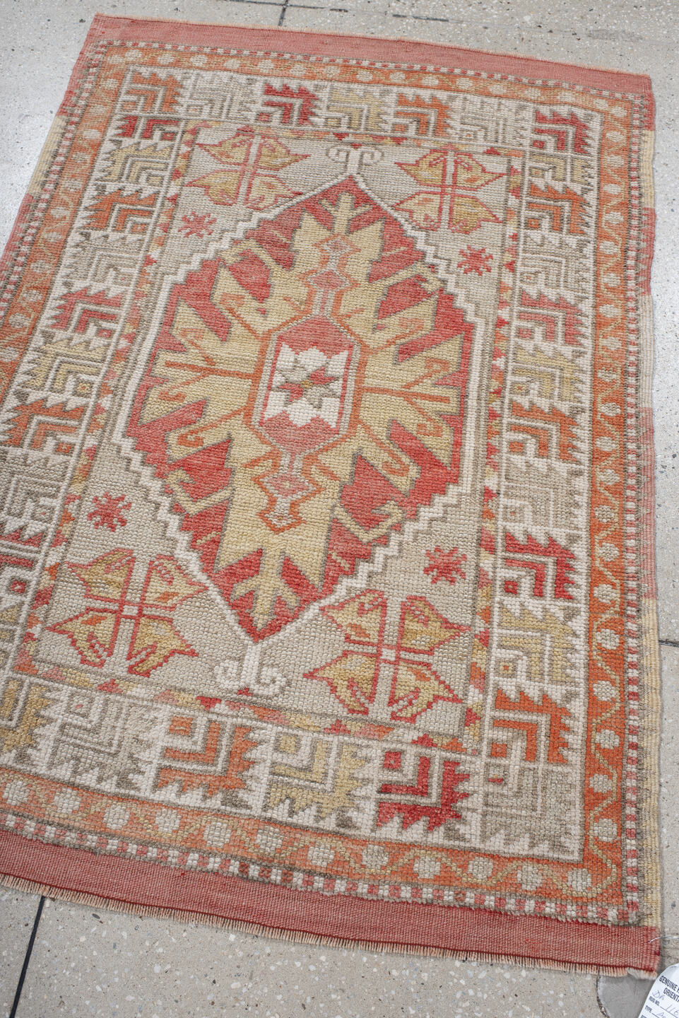 2' x 4' one-of-a-kind handmade vintage Anatolian small size rug. Color palette: ivory, coral, peach, taupe, sand, rust