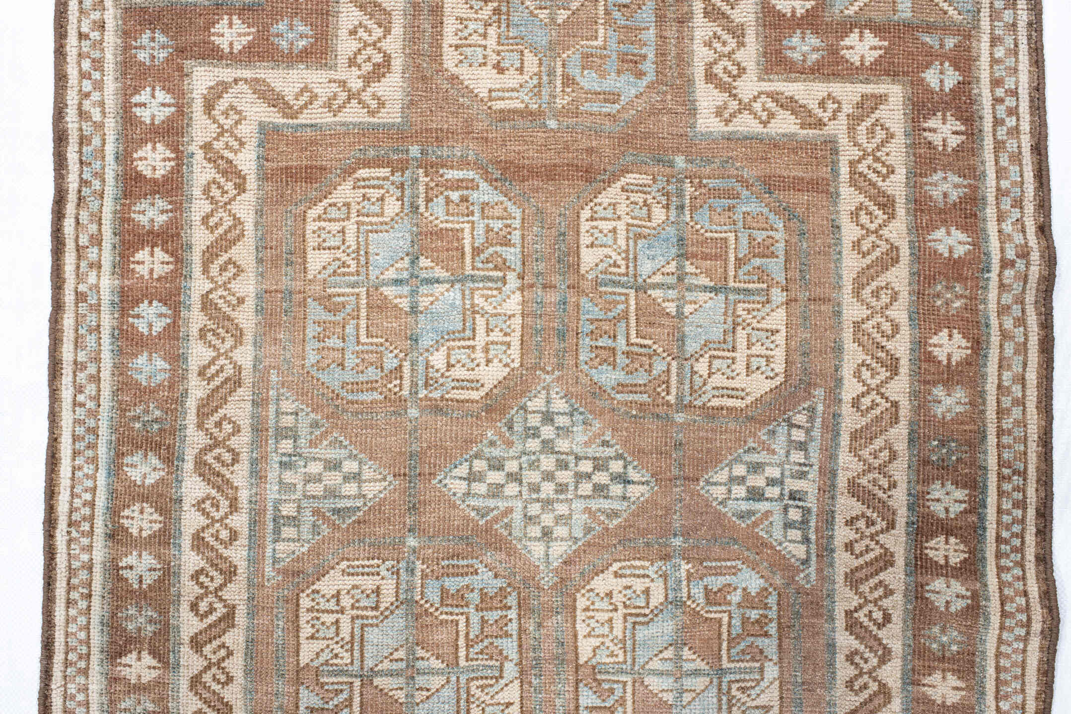 3' x 4' one-of-a-kind handmade vintage Belouch small size rug. Color palette: camel, ivory, pale blue, taupe, brown, beige