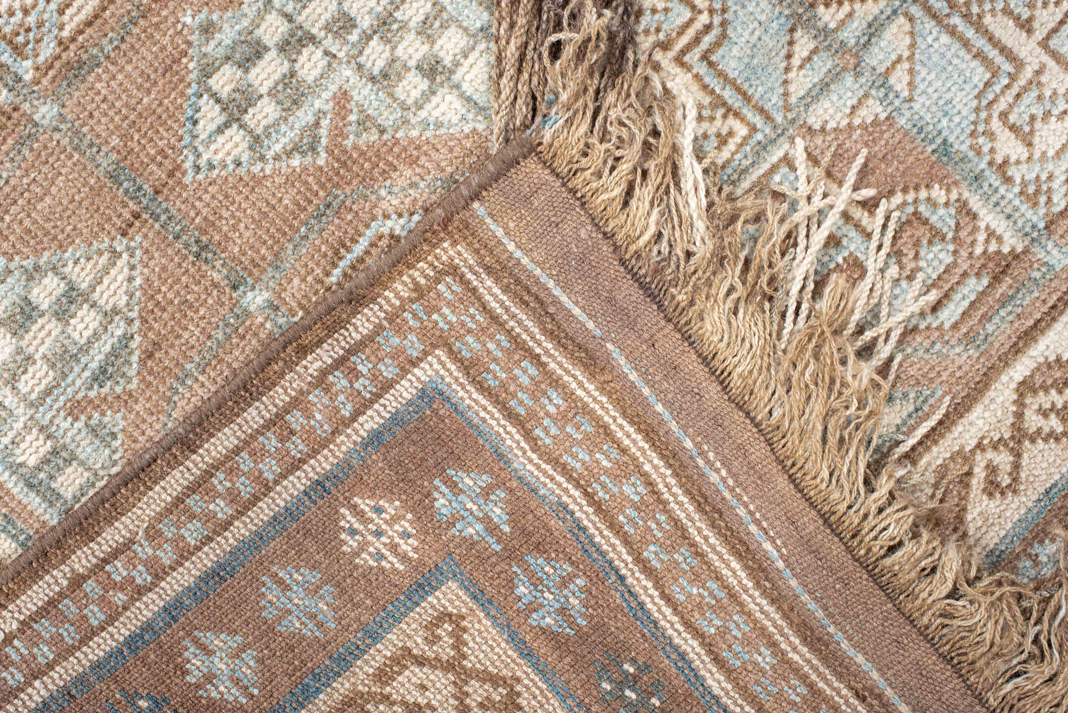 3' x 4' one-of-a-kind handmade vintage Belouch small size rug. Color palette: camel, ivory, pale blue, taupe, brown, beige