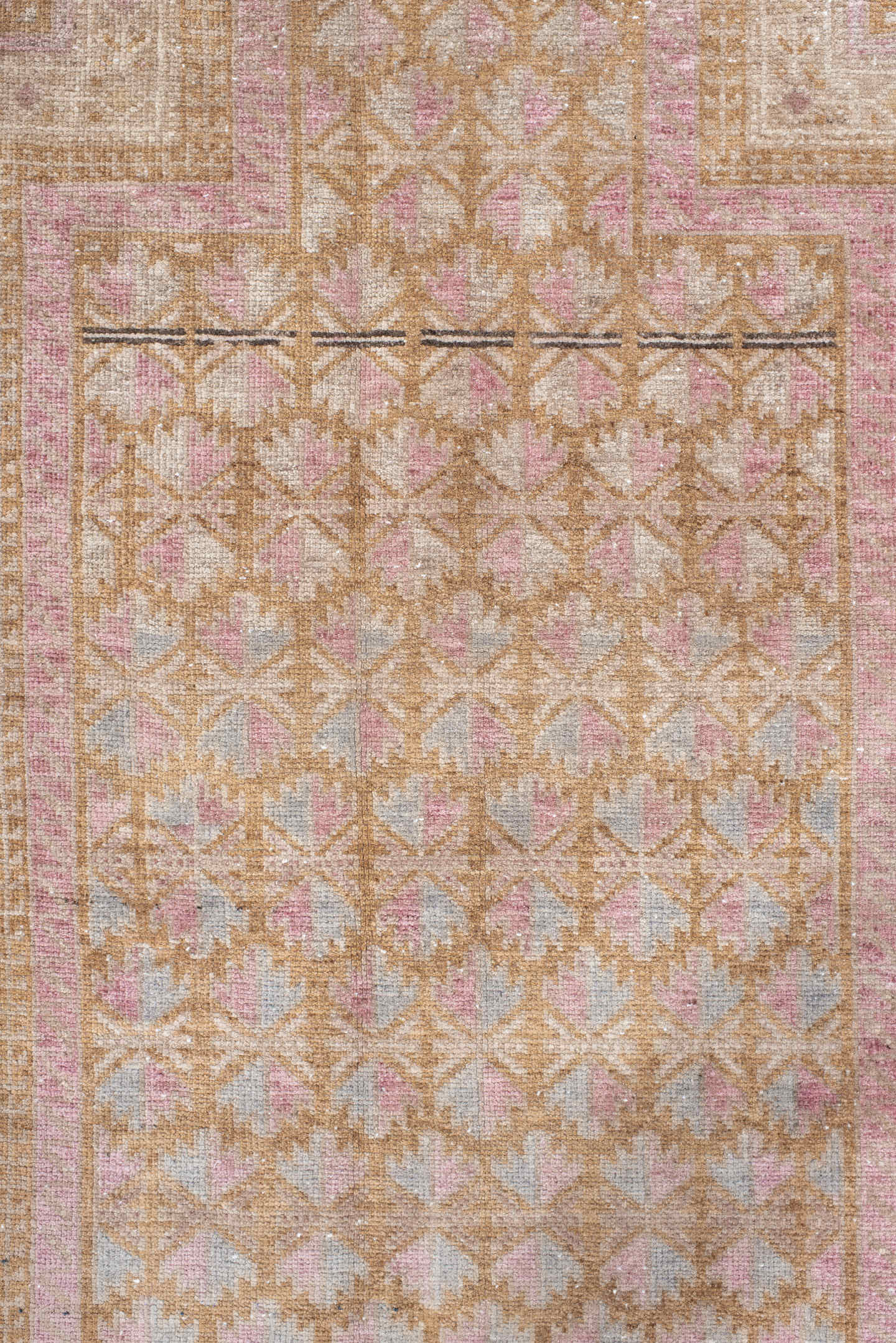 2' x 4' one-of-a-kind handmade vintage Belouch small size rug. Color palette: ivory, blush, camel, taupe, dusty rose