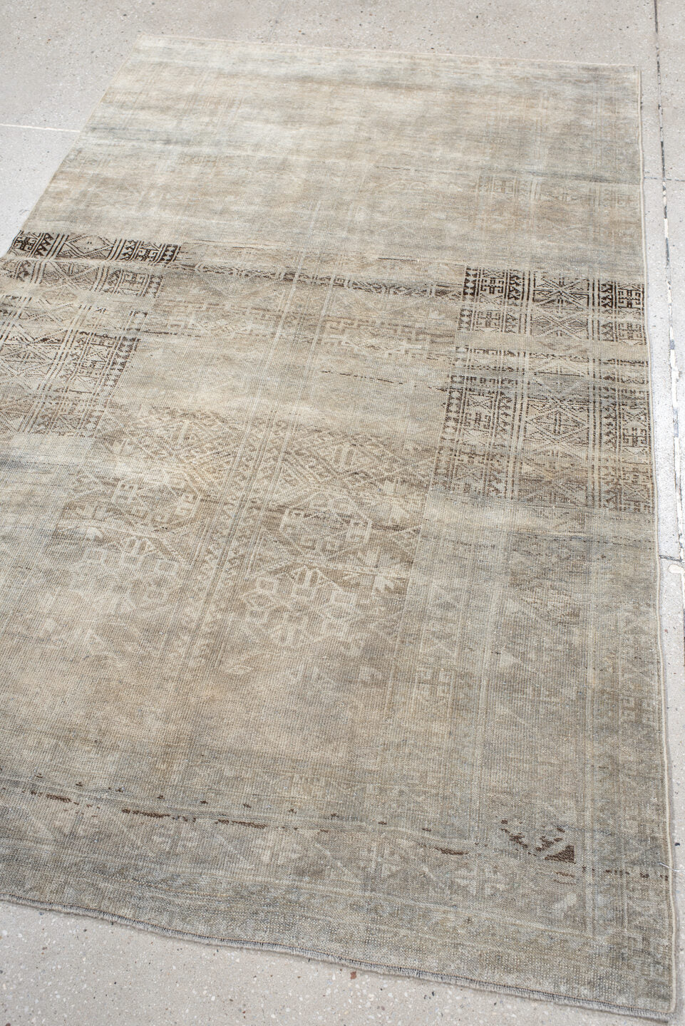 4' x 6' one-of-a-kind handmade antique Belouch small size rug. Color palette: ivory, taupe, beige, brown, greige, charcoal
