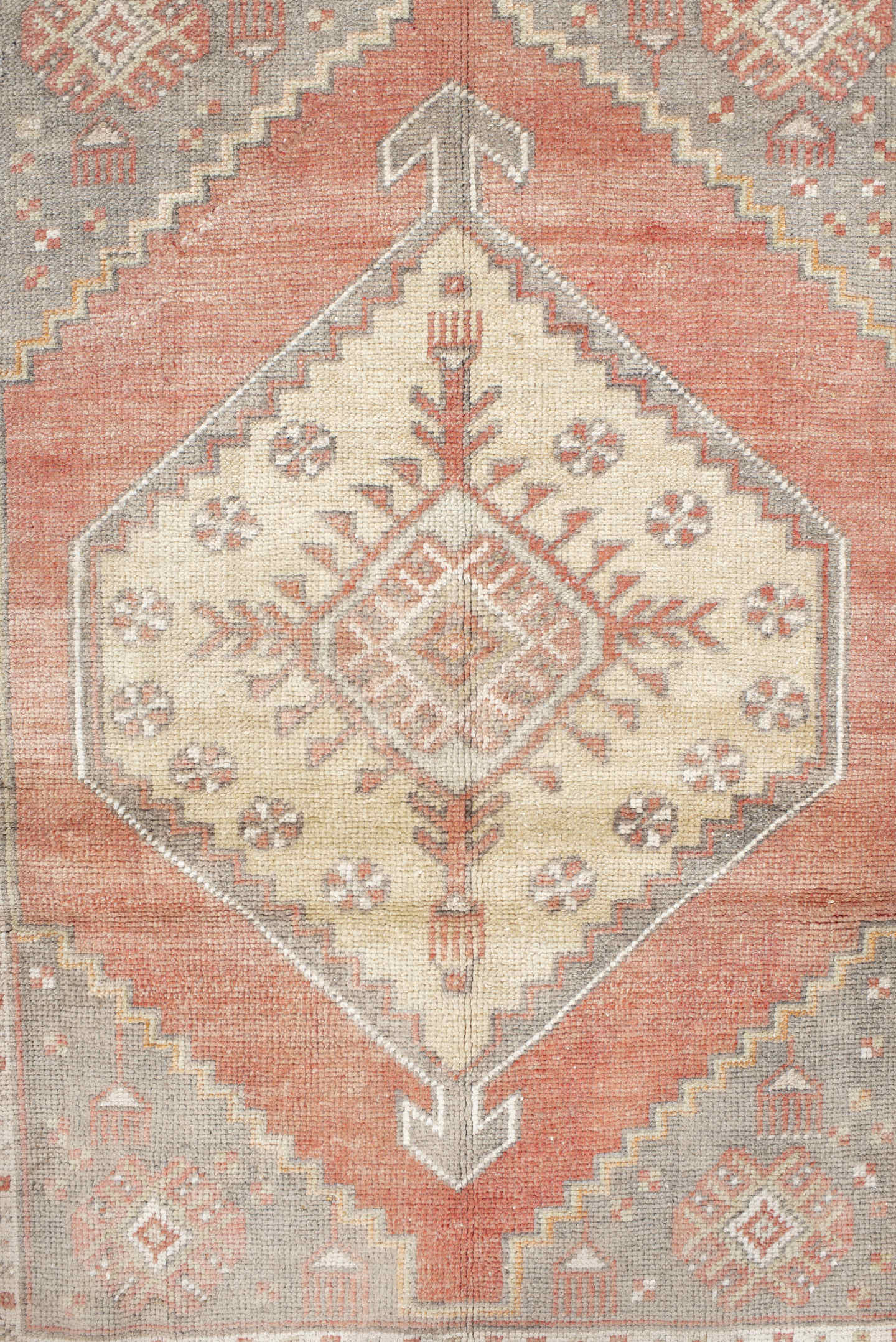 3' x 5' one-of-a-kind handmade vintage Anatolian small size rug. Color palette: taupe, coral, ivory, rose, gray, camel