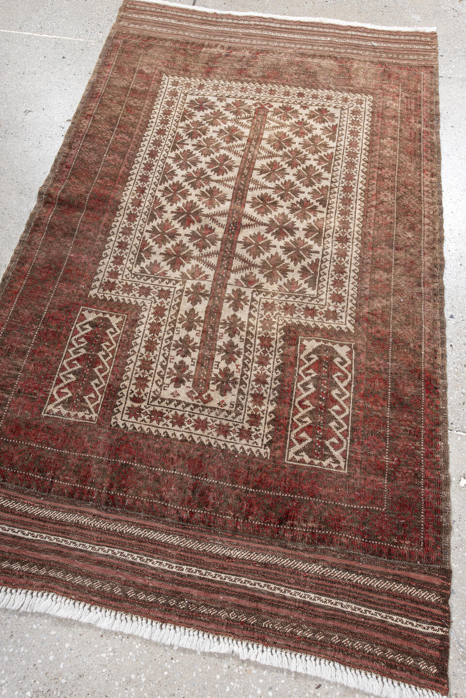 3' x 5' one-of-a-kind handmade antique Belouch small size rug. Color palette: rust, ivory, brown, burgundy, taupe, camel
