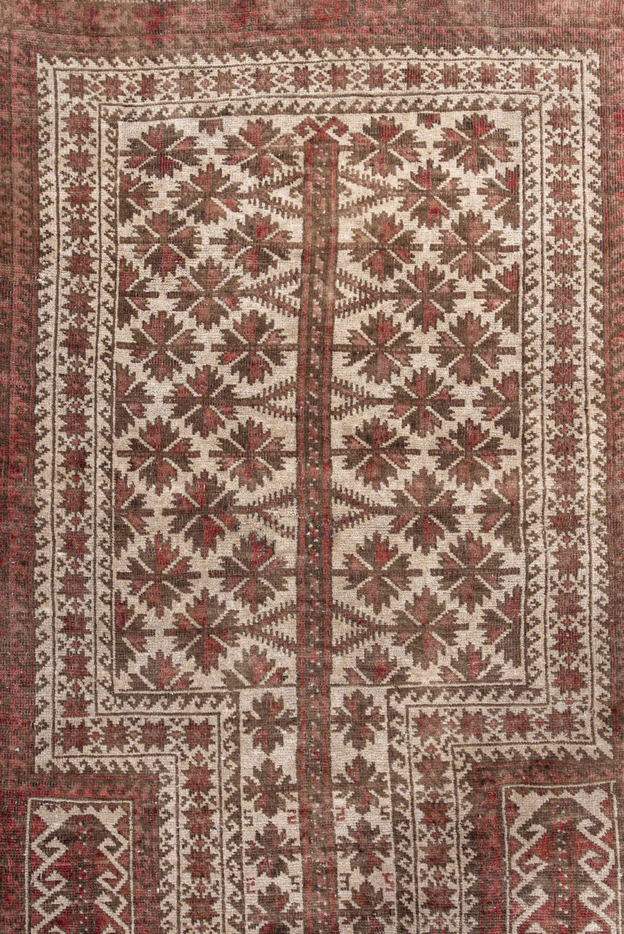 3' x 5' one-of-a-kind handmade antique Belouch small size rug. Color palette: rust, ivory, brown, burgundy, taupe, camel