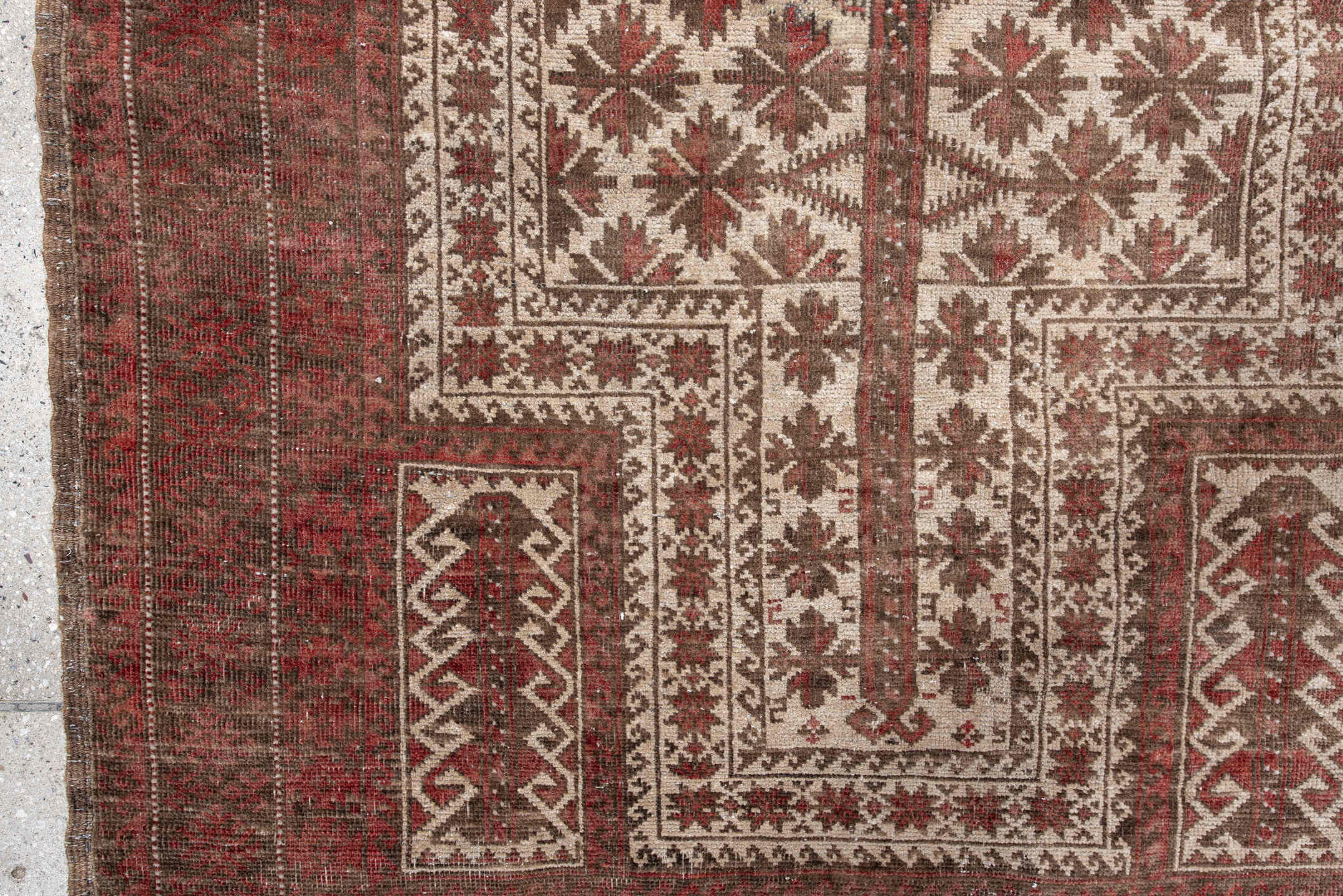 3' x 5' one-of-a-kind handmade antique Belouch small size rug. Color palette: rust, ivory, brown, burgundy, taupe, camel