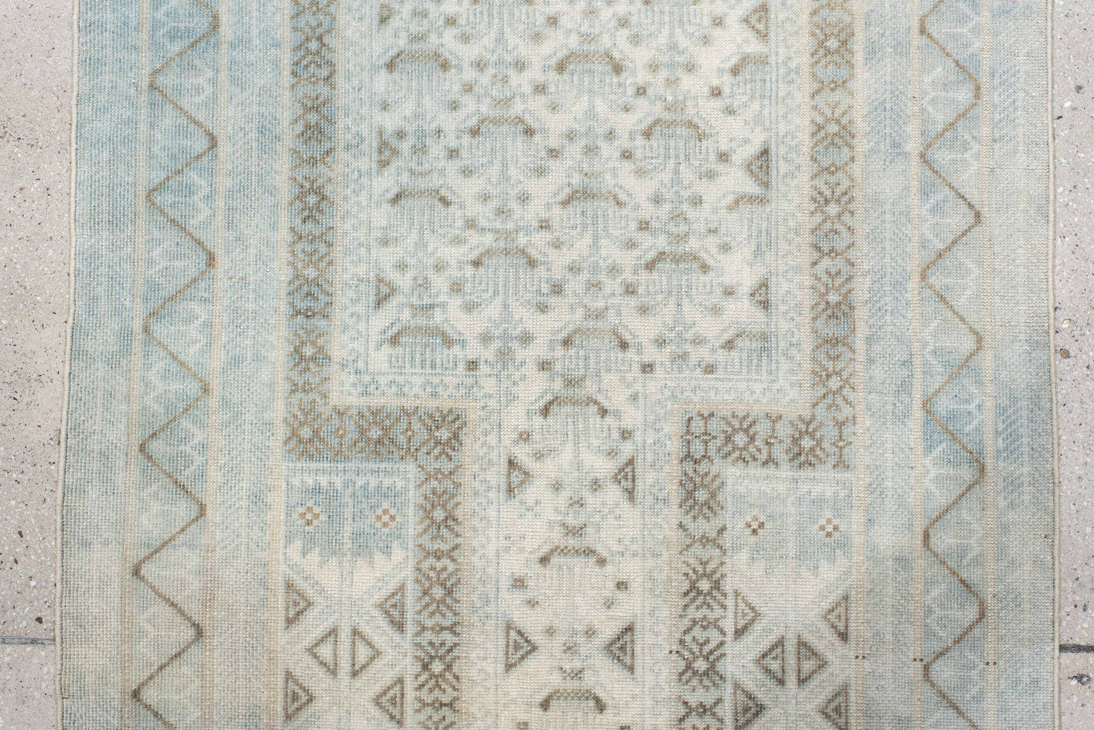 2' x 4' one-of-a-kind handmade vintage Belouch small size rug. Color palette: pale blue, ivory, taupe, light gray