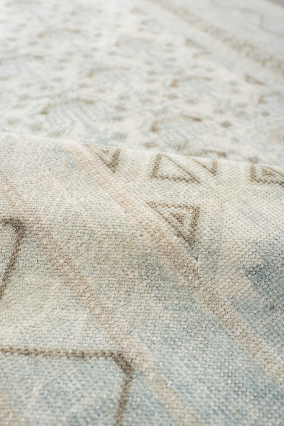 2' x 4' one-of-a-kind handmade vintage Belouch small size rug. Color palette: pale blue, ivory, taupe, light gray