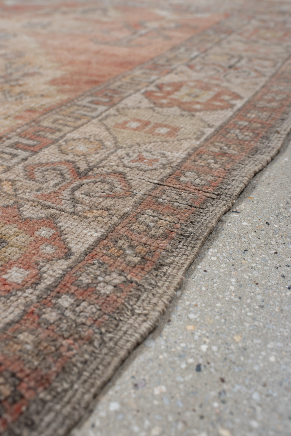 3' x 6' one-of-a-kind handmade vintage Anatol small size rug. Color palette: brown, gray, light gray, off-white, pink